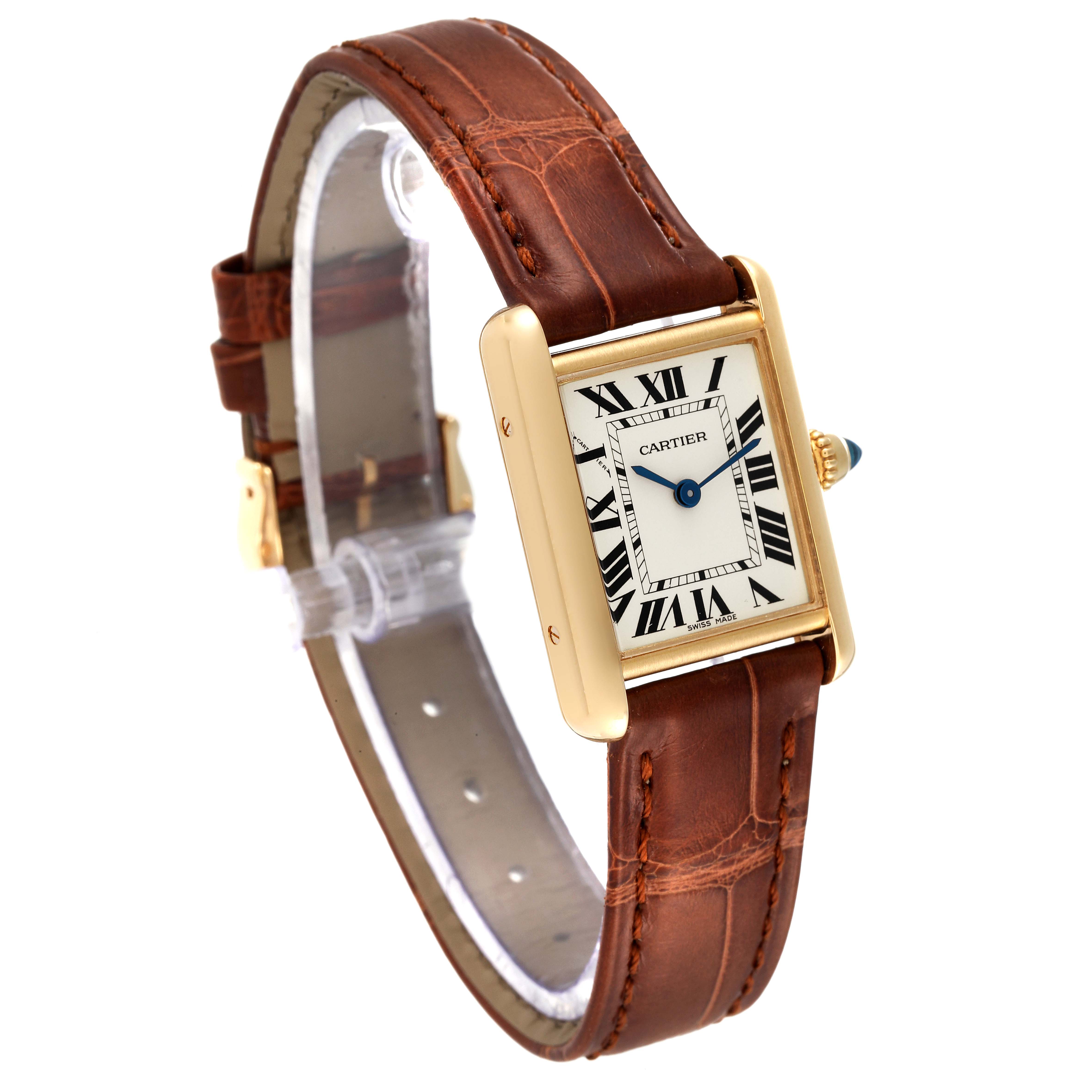 The image shows a Cartier Tank Louis W1529856 Women
s Yellow Gold Silver Dial W1529856 Women
s Yellow Gold Silver Dial watch with a rectangular gold case, white dial, brown leather strap, and blue hands, viewed from a three-quarter angle.