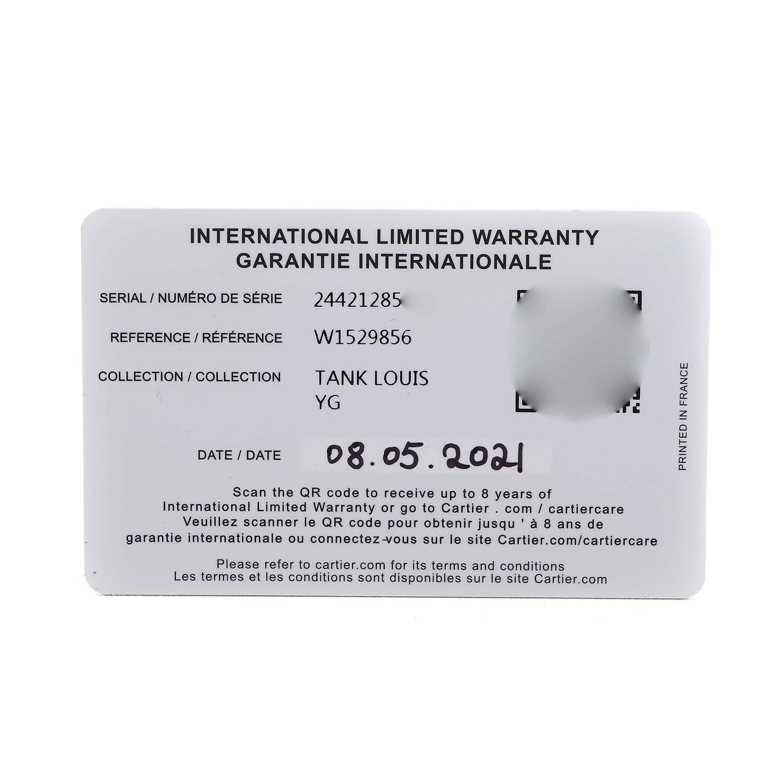 The image shows an international warranty card for the Cartier Tank Louis W1529856 Women's Yellow Gold Silver Dial watch, displaying serial and reference numbers.