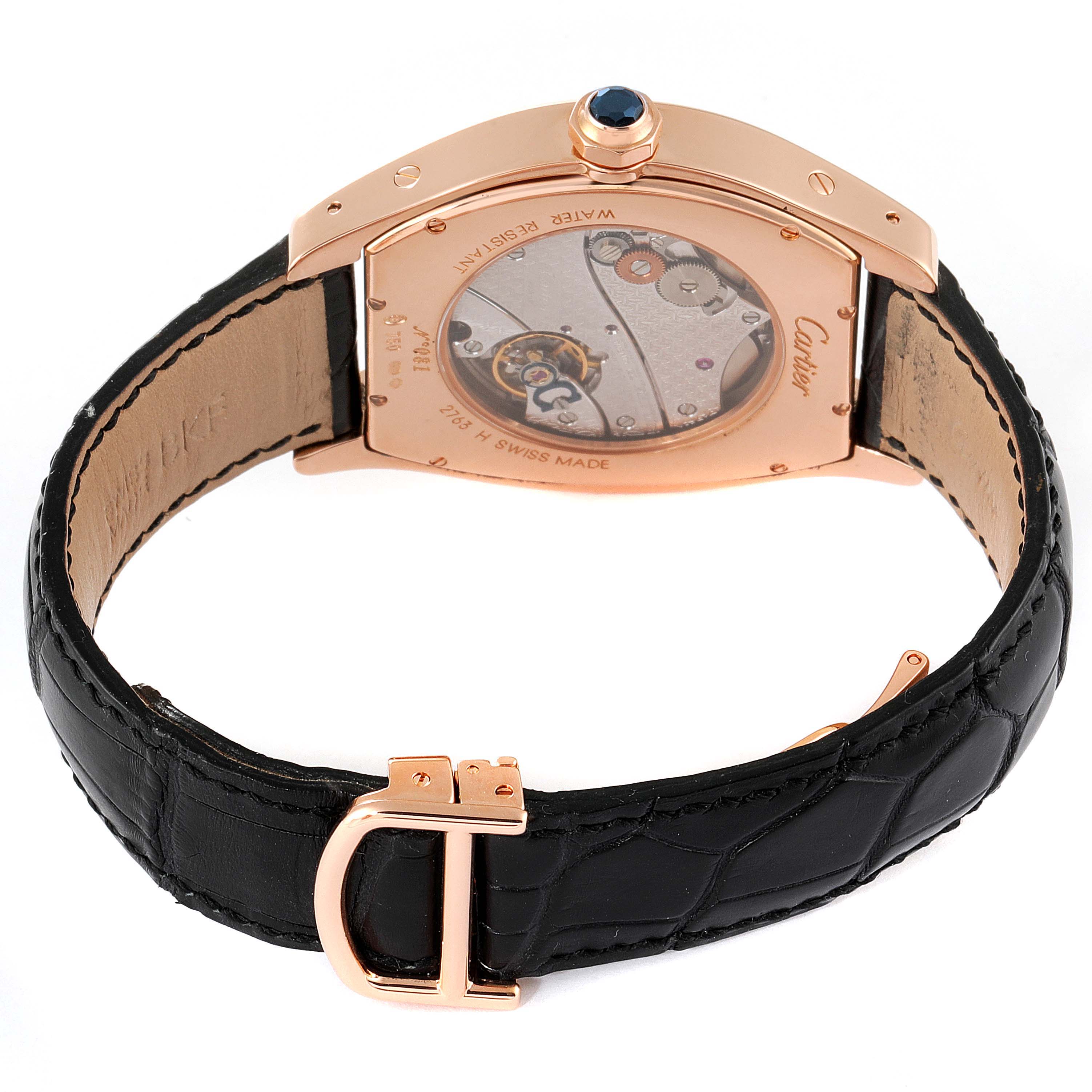 The image shows the back view of a Cartier Tortue W1546051 Men's Rose Gold Silver Dial W1546051 Men's Rose Gold Silver Dial watch, highlighting its movement mechanism, leather strap, and buckle.