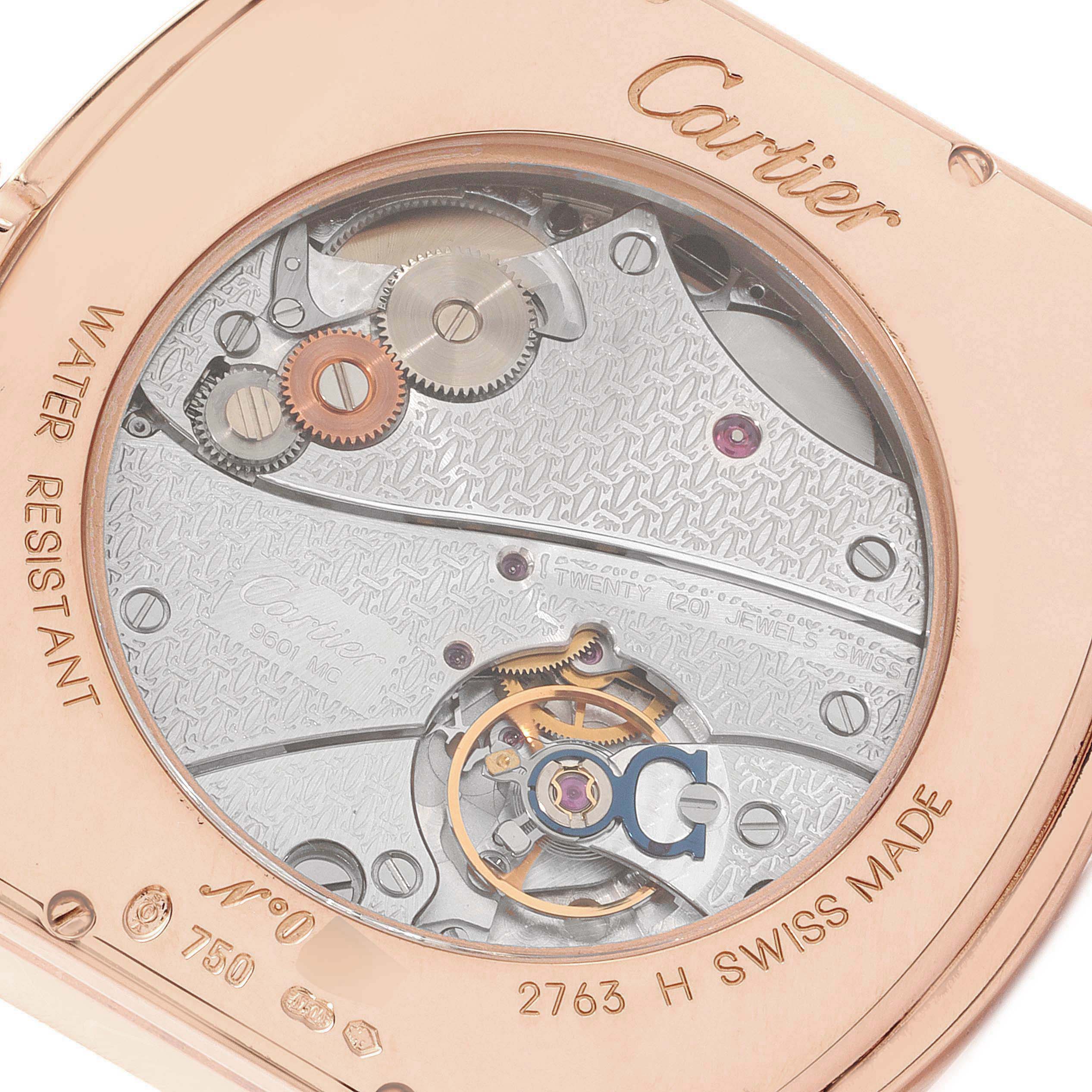 The image shows the back of a Cartier Tortue W1546051 Men's Rose Gold Silver Dial W1546051 Men's Rose Gold Silver Dial model watch, highlighting the intricate movement and engraved details.