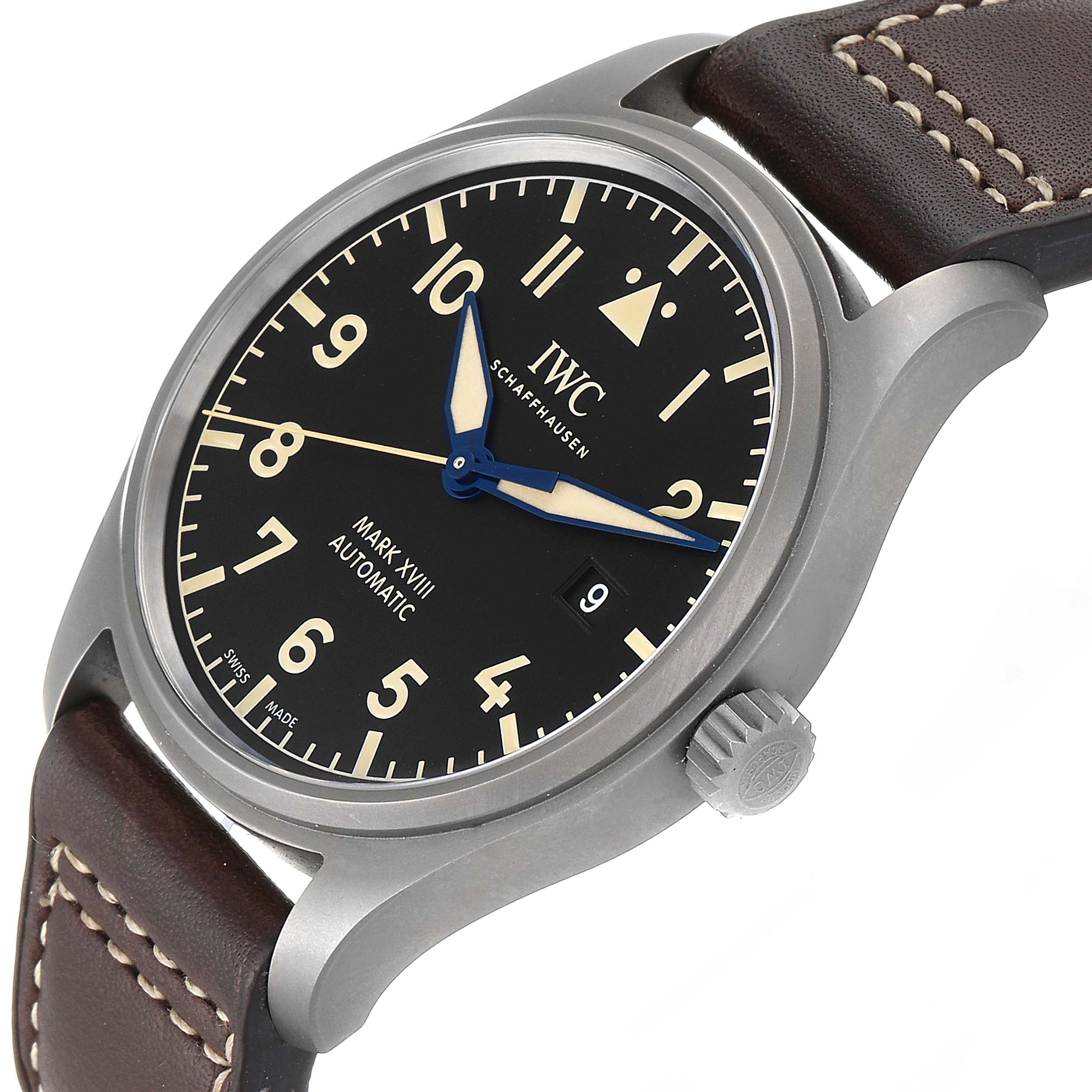 The image shows an angled close-up of the IWC Pilot IW327006 Men's Titanium Black Dial IW327006 Men's Titanium Black Dial Mark XVIII watch, highlighting its dial, crown, and leather strap.