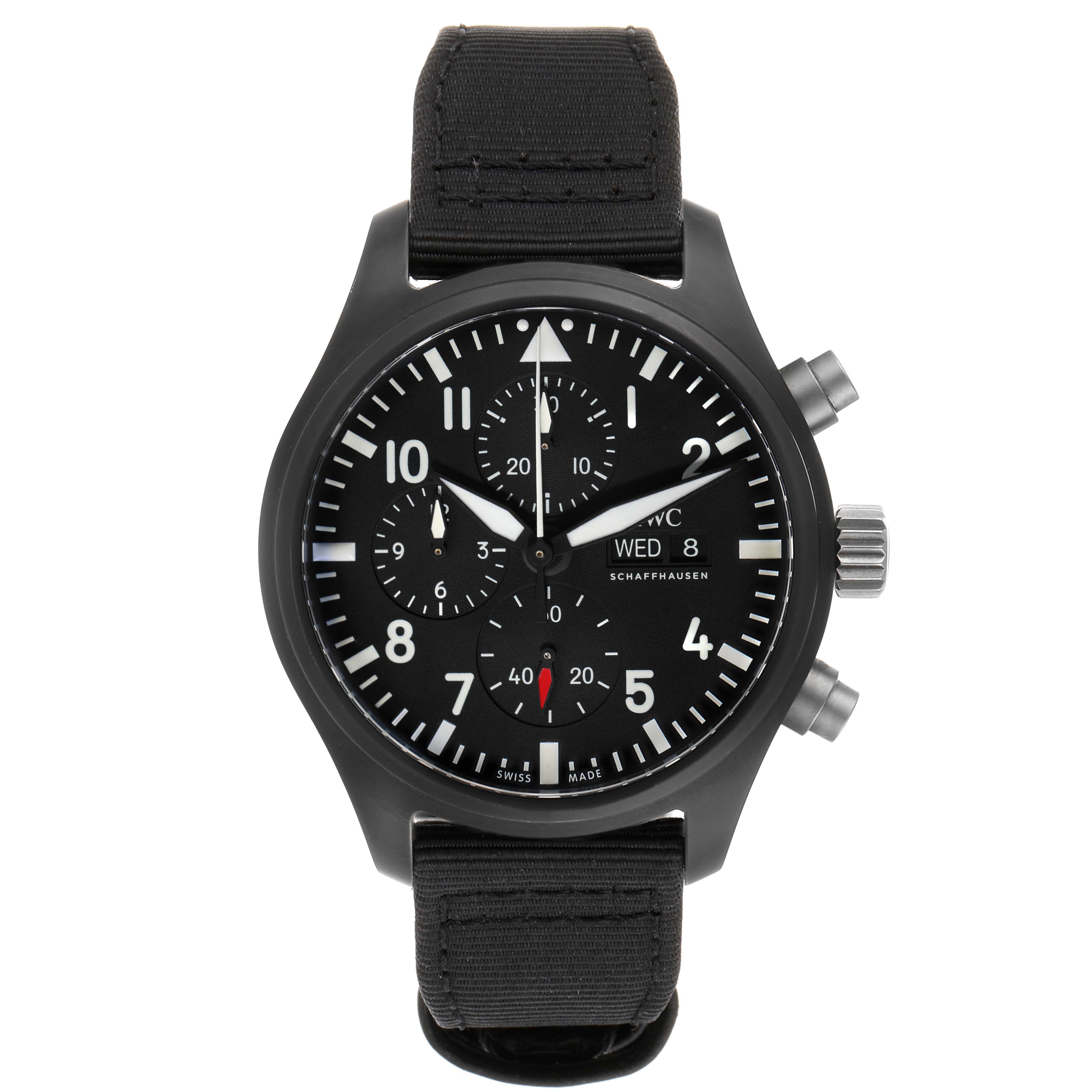 The IWC Pilot IW389101 Men
s Titanium Black Dial IW389101 Men
s Titanium Black Dial model watch is shown from a front angle, displaying its black dial, three sub-dials, and black fabric strap.