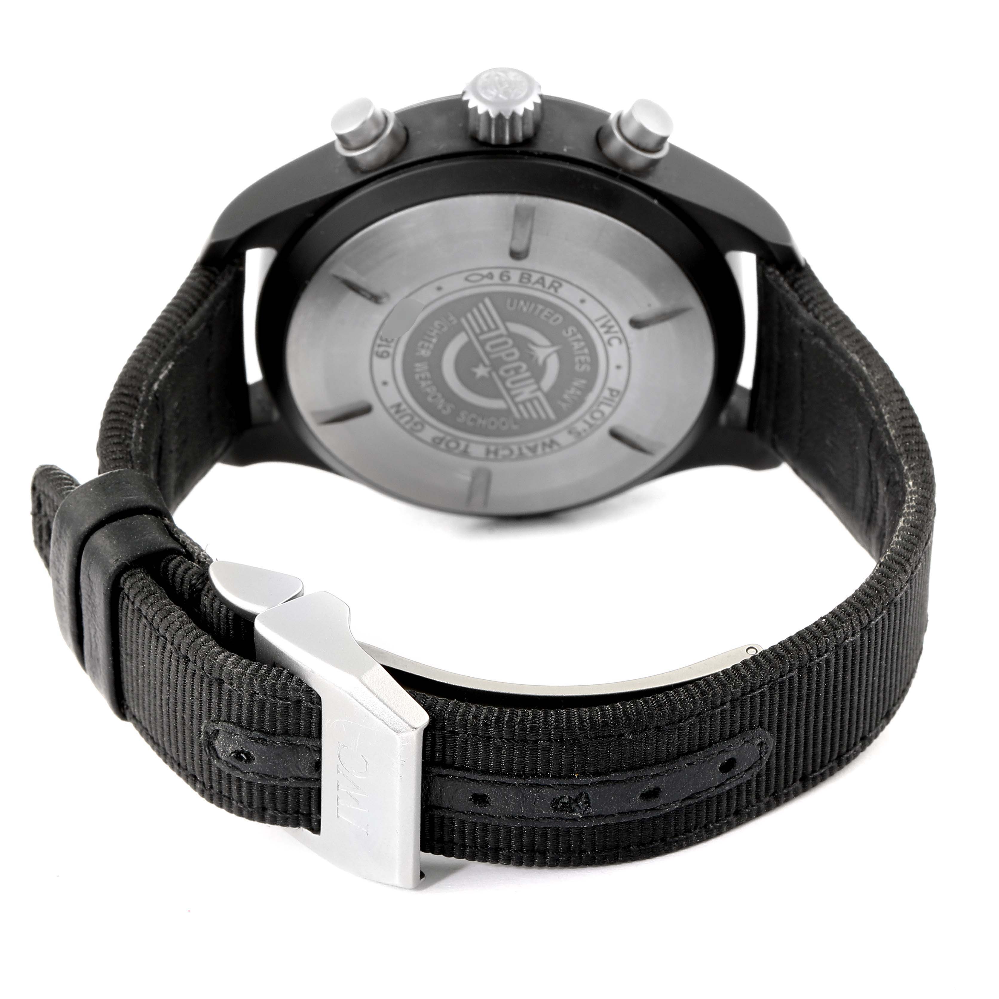 The image shows the back case and strap of the IWC Pilot IW389101 Men
s Titanium Black Dial IW389101 Men
s Titanium Black Dial model watch, featuring the branding and clasp.