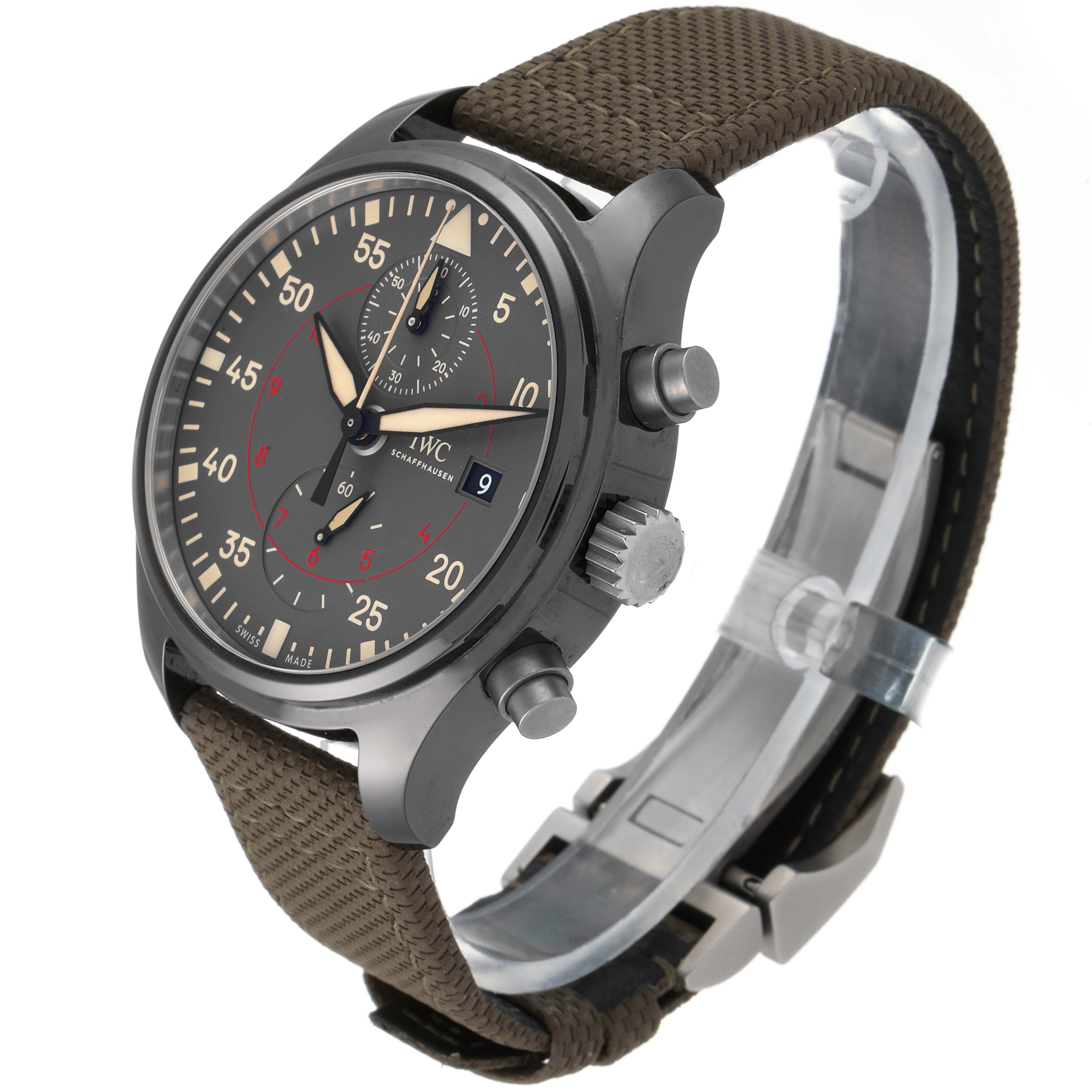 This image shows an angled view of an IWC Pilot IW389002 Men's Titanium Black Dial IW389002 Men's Titanium Black Dial model watch, highlighting its dial, crown, pushers, and strap.