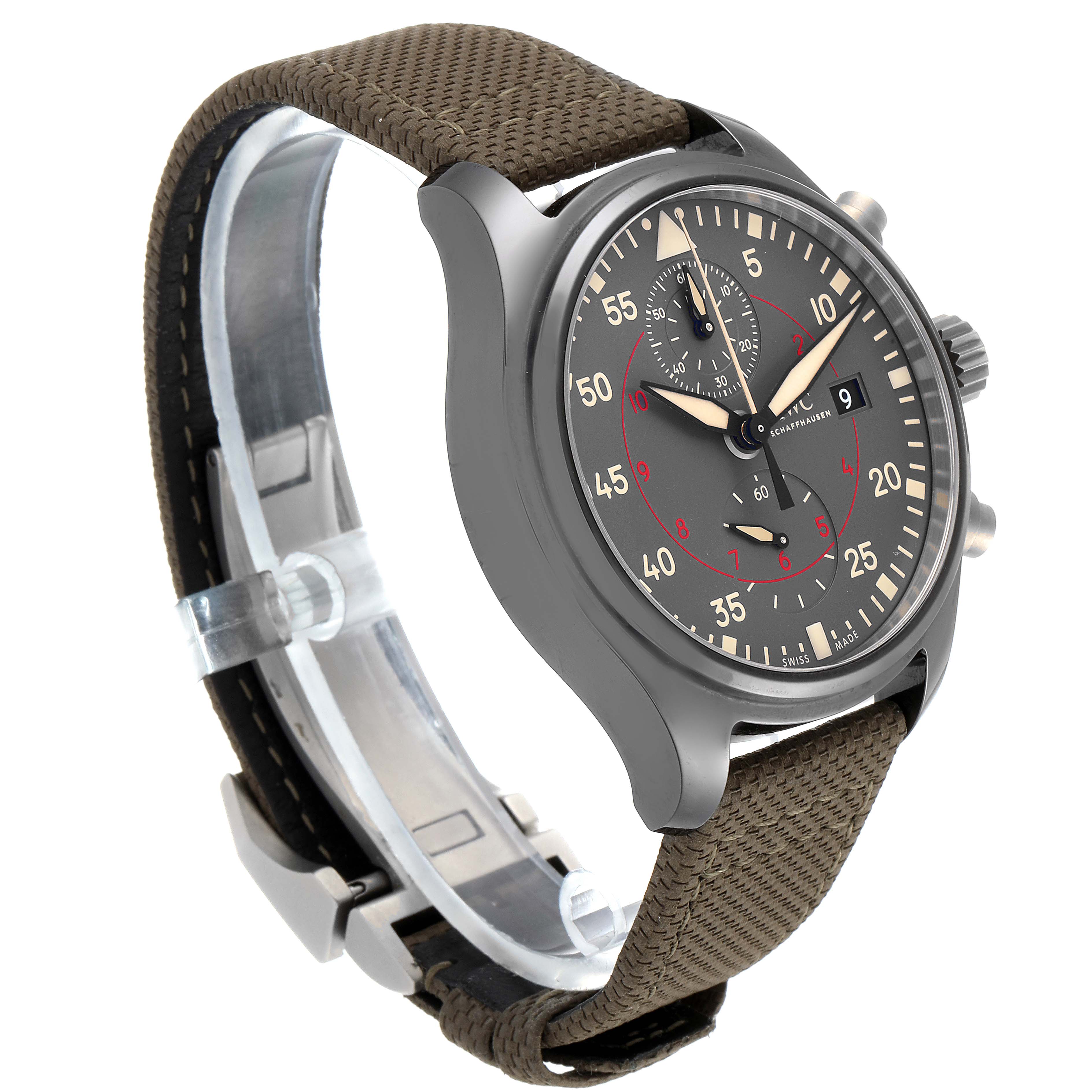 The image shows a side-angle view of an IWC Pilot IW389002 Men's Titanium Black Dial IW389002 Men's Titanium Black Dial watch, highlighting its face, dial, and fabric strap.