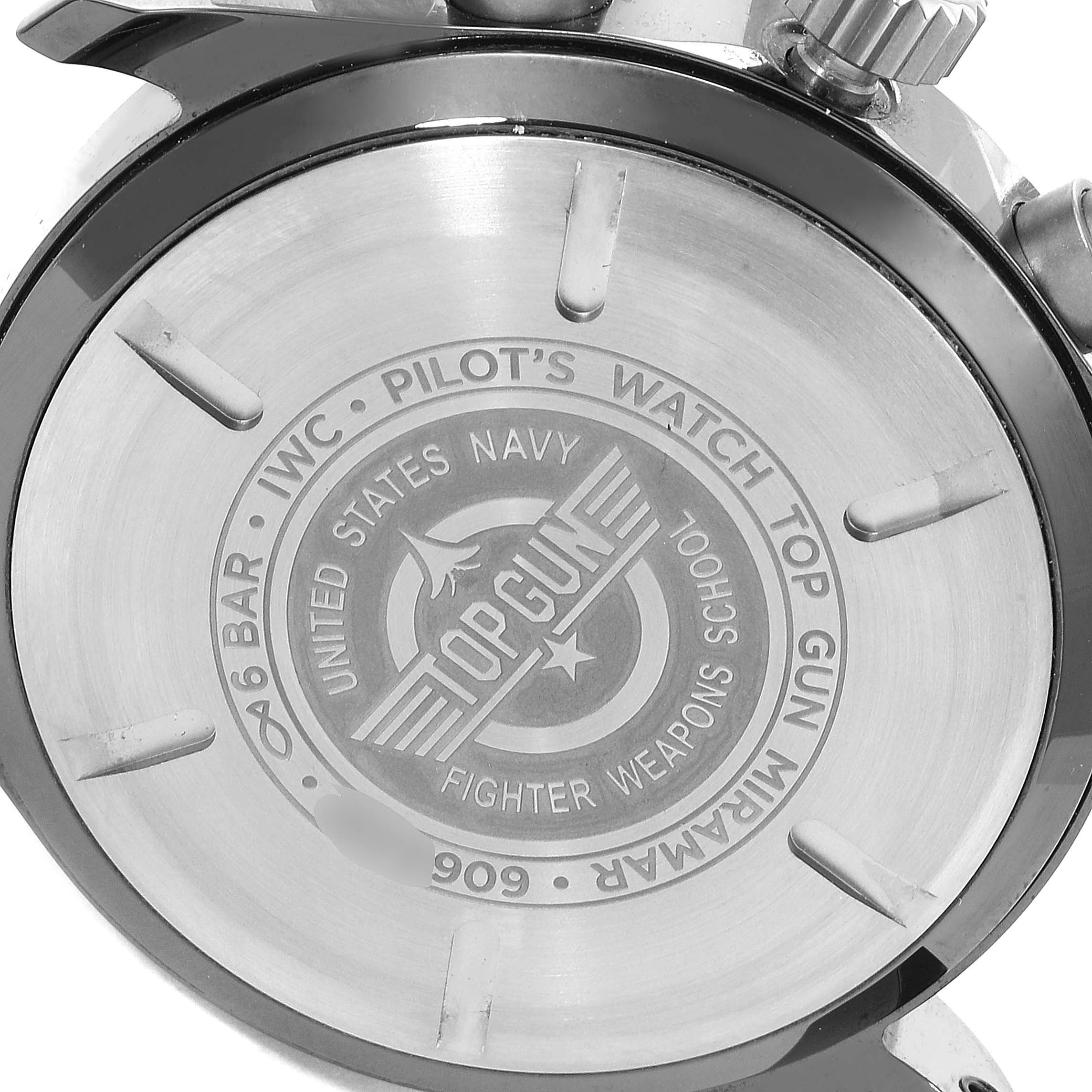 The image shows the back casing of the IWC Pilot IW389002 Men's Titanium Black Dial IW389002 Men's Titanium Black Dial Top Gun watch, highlighting its engraved details.