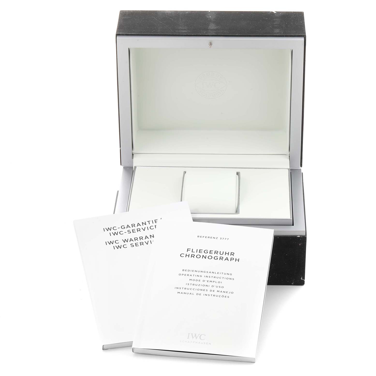 This image shows an open box and instruction booklets for the IWC Pilot IW389002 Men's Titanium Black Dial IW389002 Men's Titanium Black Dial model watch.