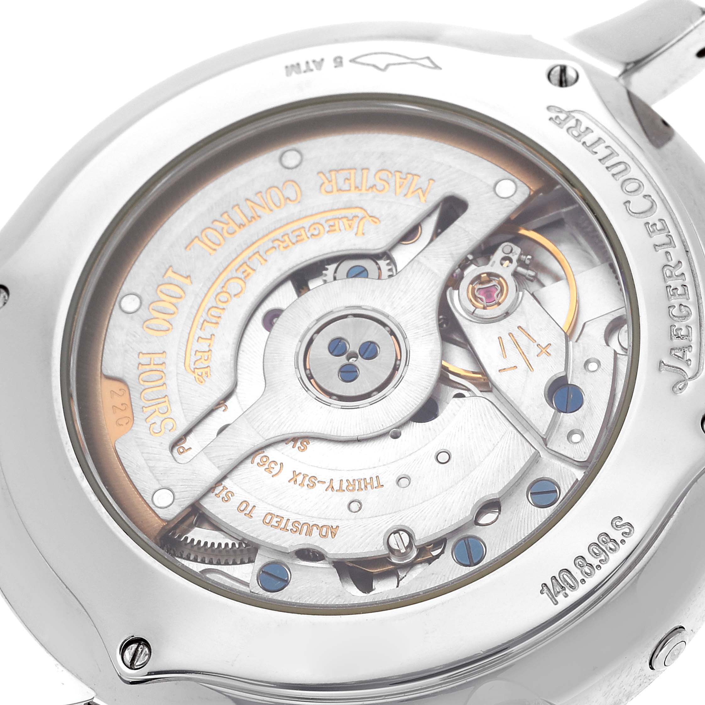 The image shows the back view of a Jaeger-LeCoultre Master model, highlighting its exposed mechanical movement.