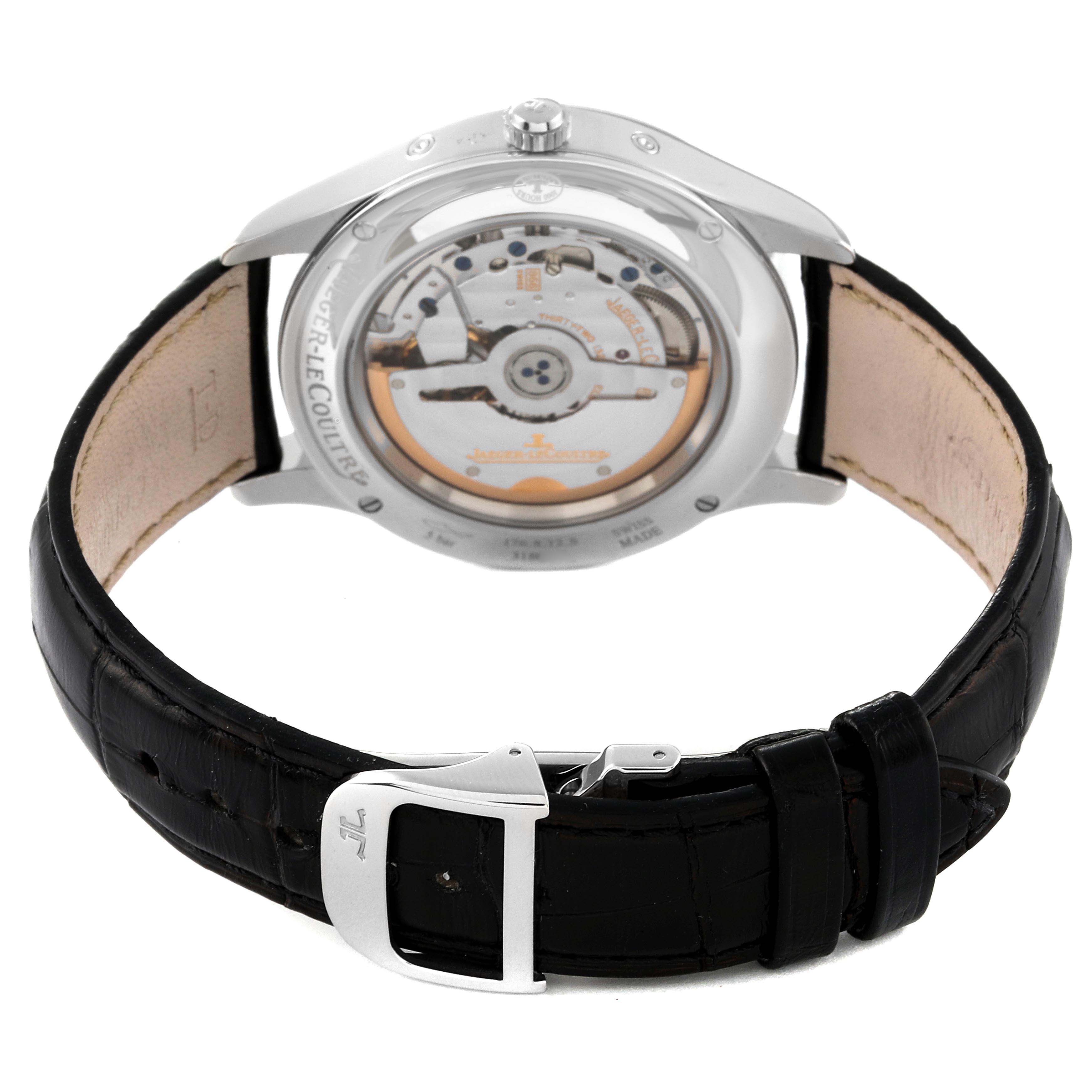 This image shows the back view of a Jaeger-LeCoultre Master model watch, highlighting its open case back and black leather strap with a clasp.