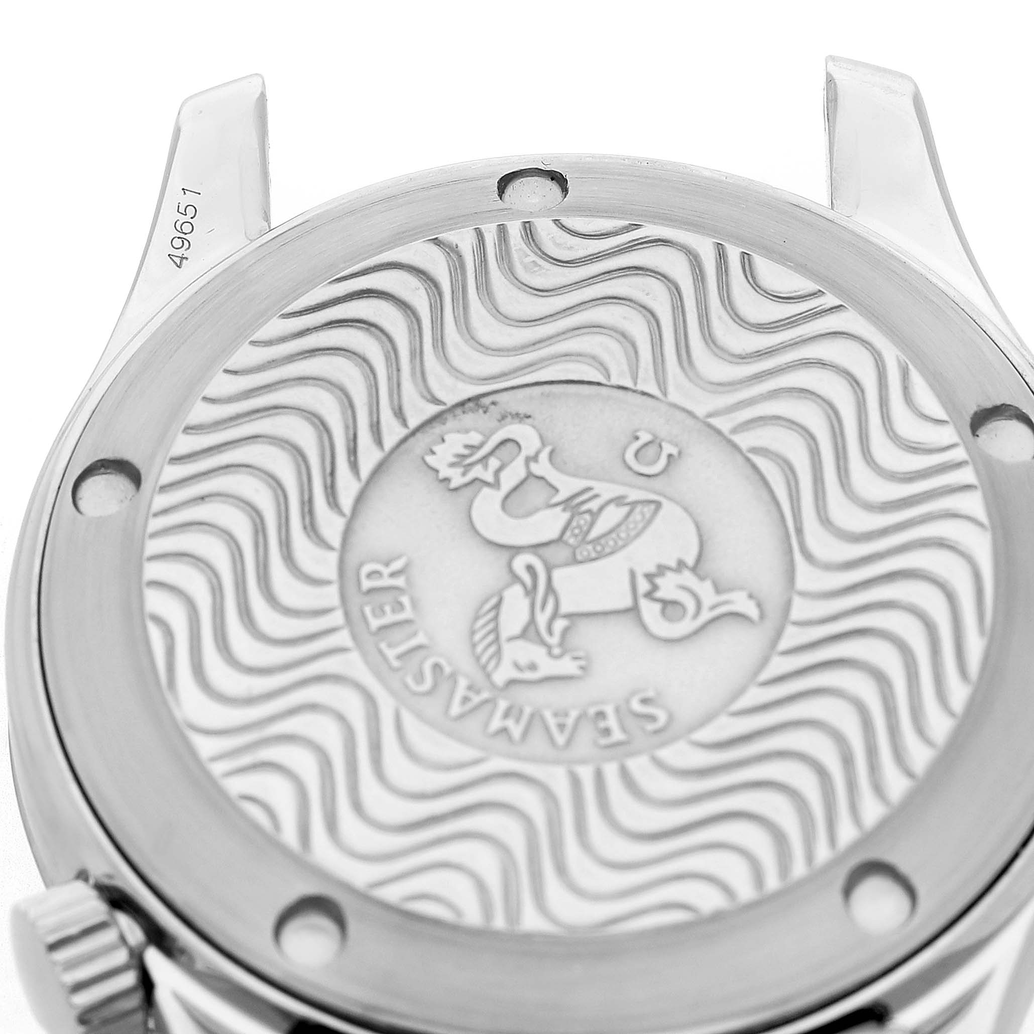 The image shows the back case of an Omega Seamaster 2551.80.00 Men's Stainless Steel Blue Dial watch with its engraved logo and wave pattern.