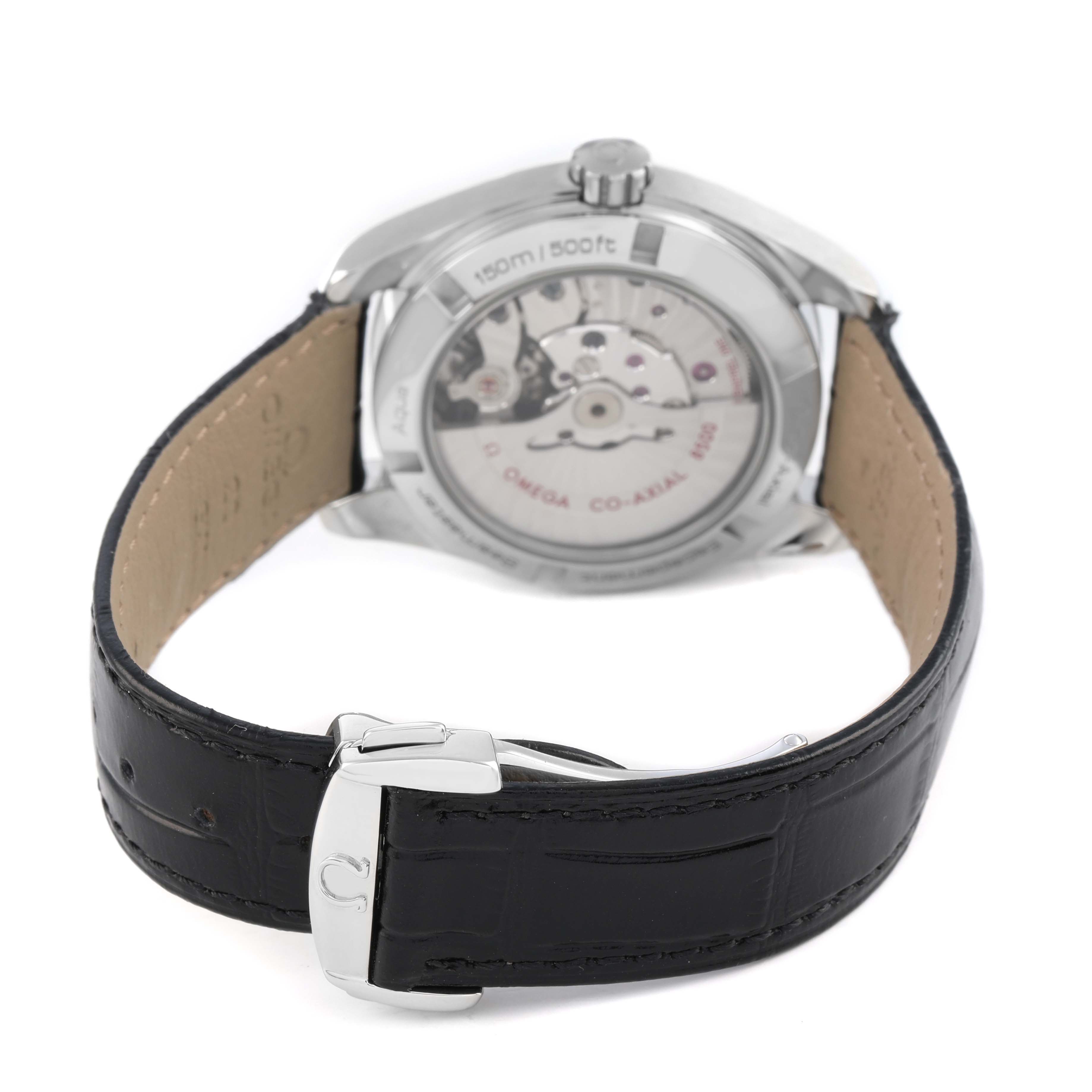 The Omega Aqua Terra 231.13.39.21.01.001 Men's Stainless Steel Beige Dial watch is shown from the back, highlighting the transparent case back and leather strap with a clasp.