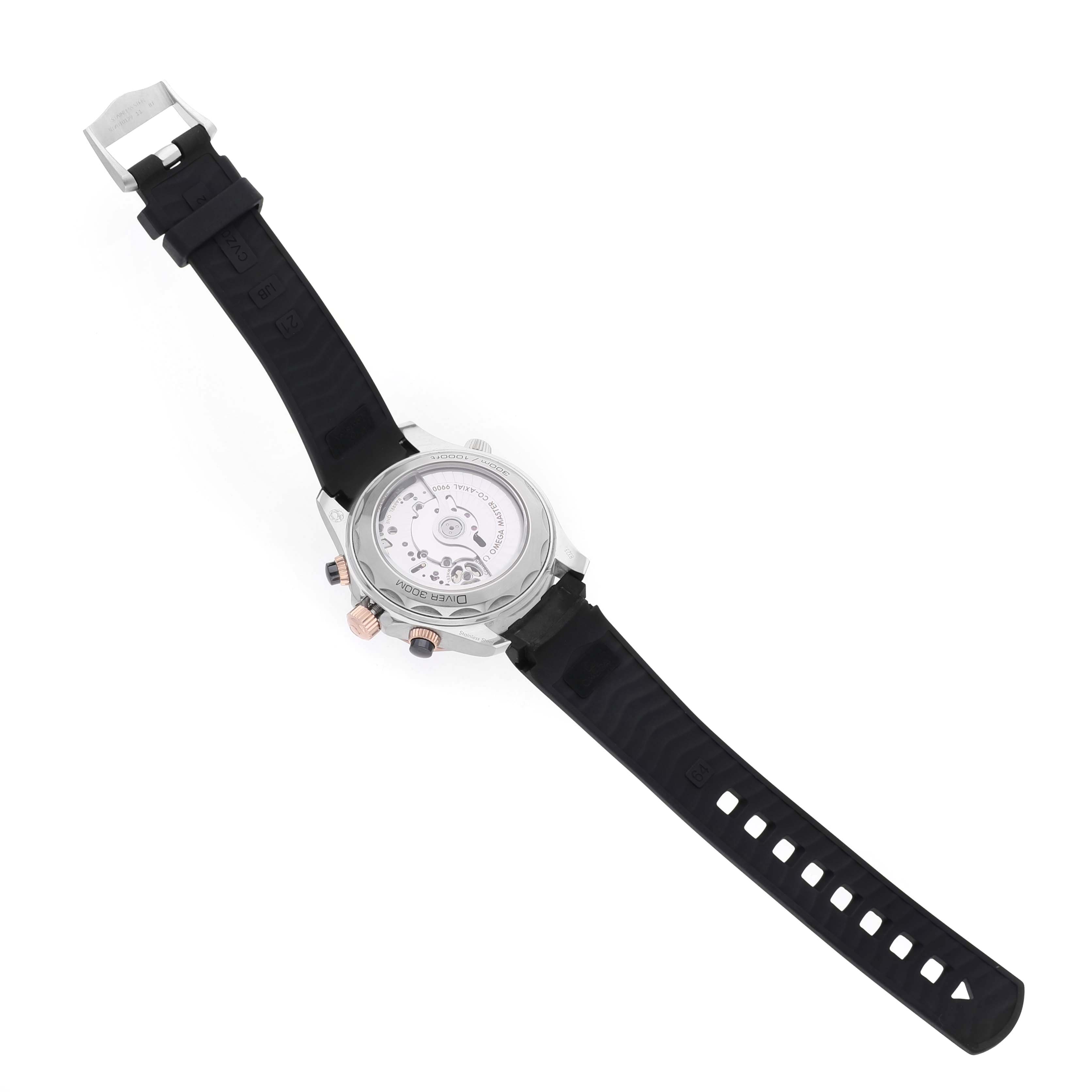 The image shows the back of an Omega Seamaster 210.22.44.51.01.001 Men's Steel and Gold (two tone) Black Dial watch, highlighting the movement and black rubber strap.