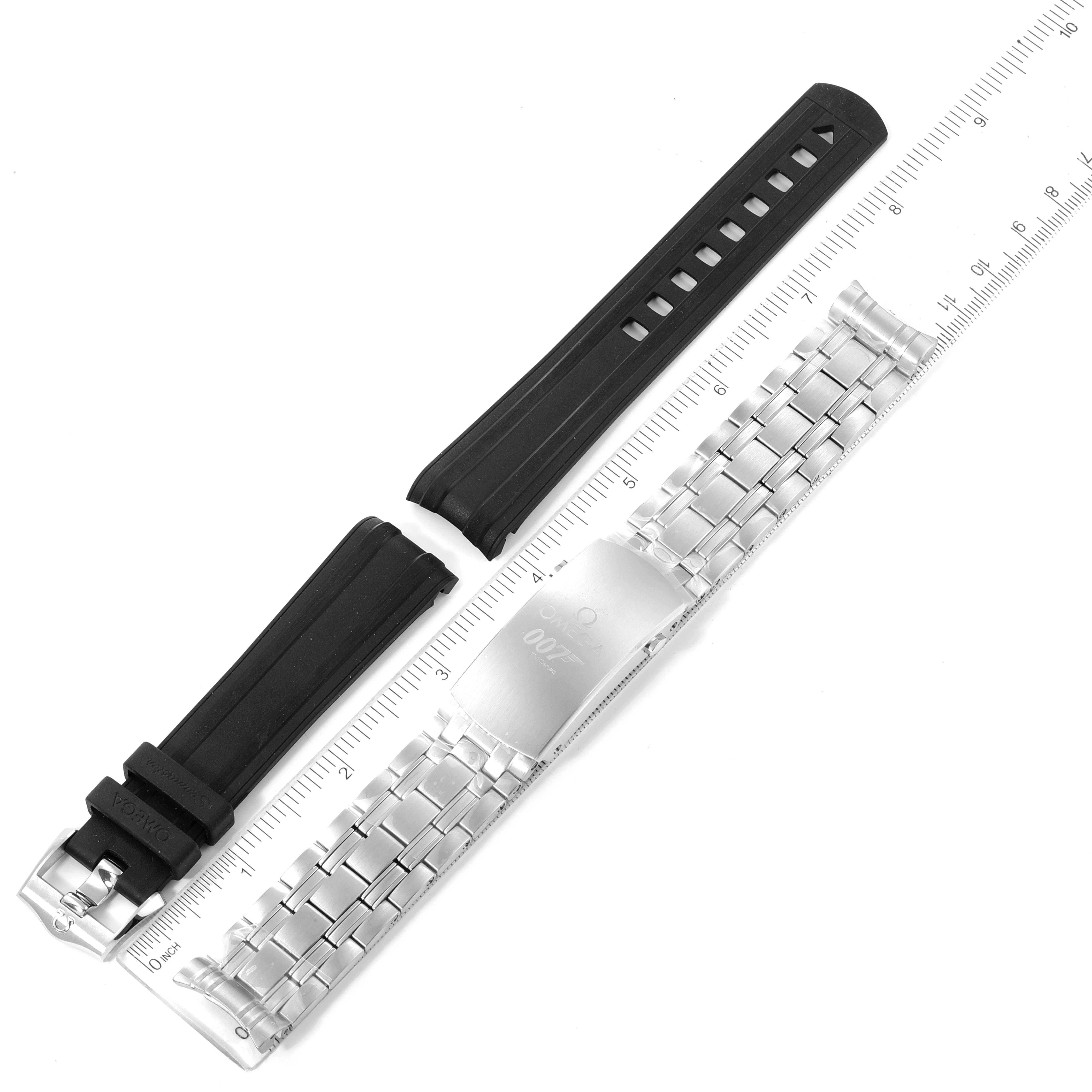This image shows both rubber and metal replacement straps for the Omega Seamaster 210.22.42.20.01.004 Men's Stainless Steel Black Dial 210.22.42.20.01.004 Men's Stainless Steel Black Dial model, displayed flat alongside a ruler.