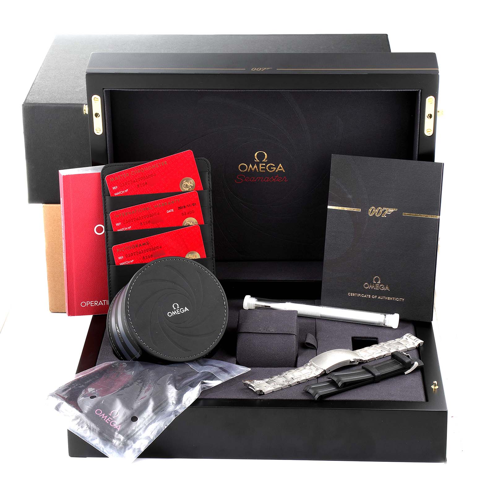 This image depicts the accessories kit for an Omega Seamaster 210.22.42.20.01.004 Men's Stainless Steel Black Dial 210.22.42.20.01.004 Men's Stainless Steel Black Dial, including documents, a bracelet, and a box with branding.