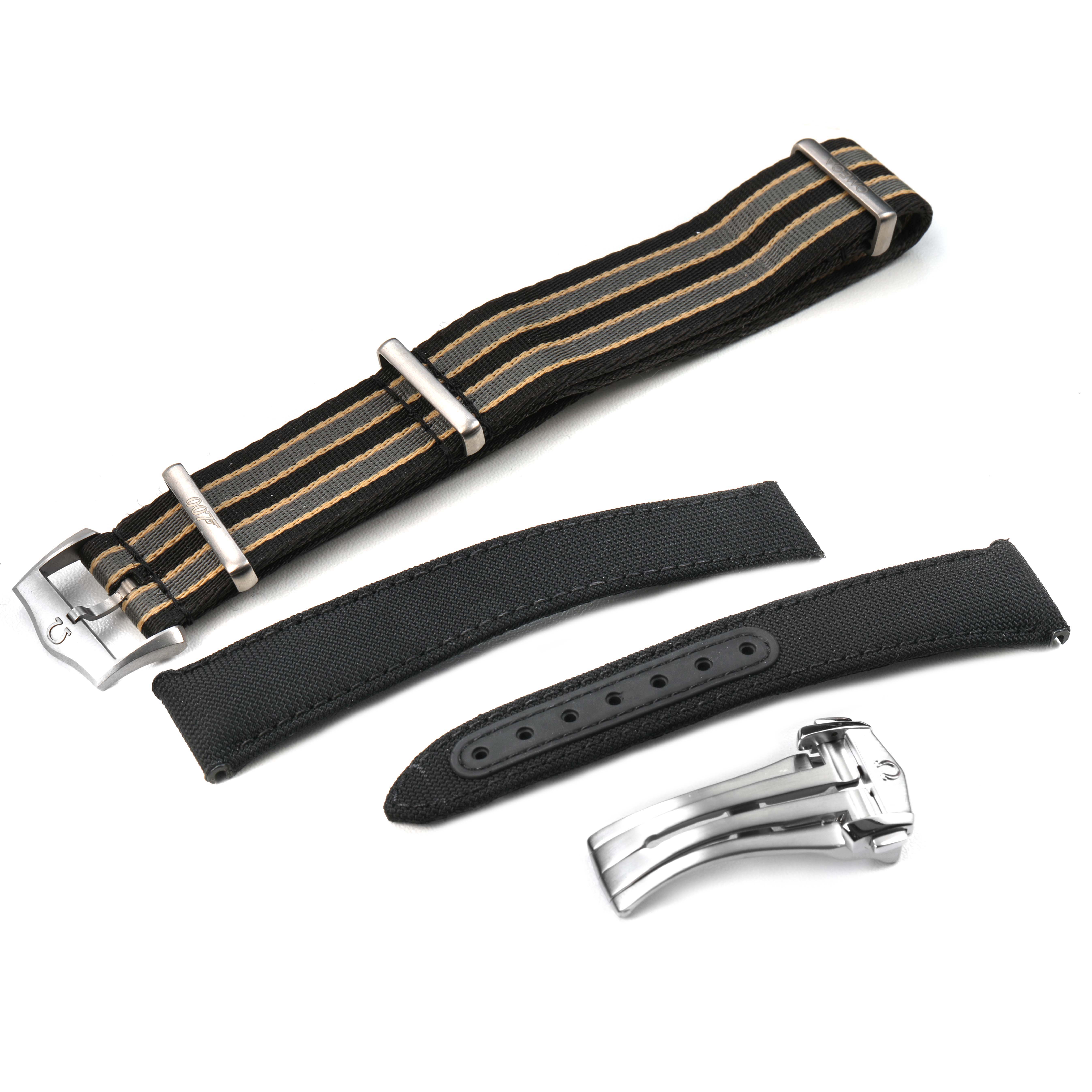 The image shows Omega Speedmaster 310.30.42.50.01.002 Men's Stainless Steel Black Dial watch straps and a metal clasp, including a striped NATO strap and two black fabric straps.