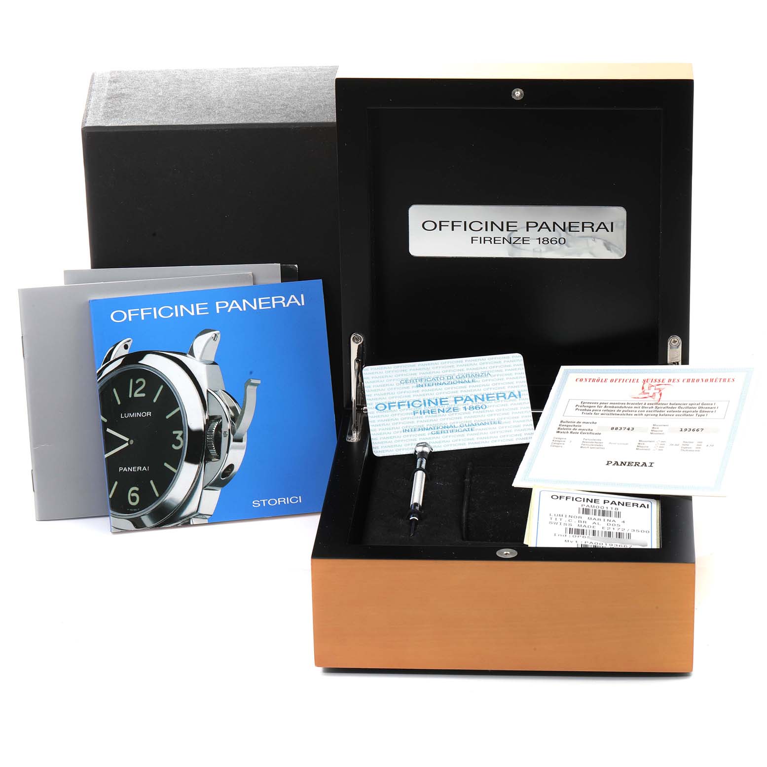 The image shows a Panerai Luminor PAM00118 Men's Titanium Brown Dial PAM00118 Men's Titanium Brown Dial watch box including documentation, a manual, and a small tool inside.