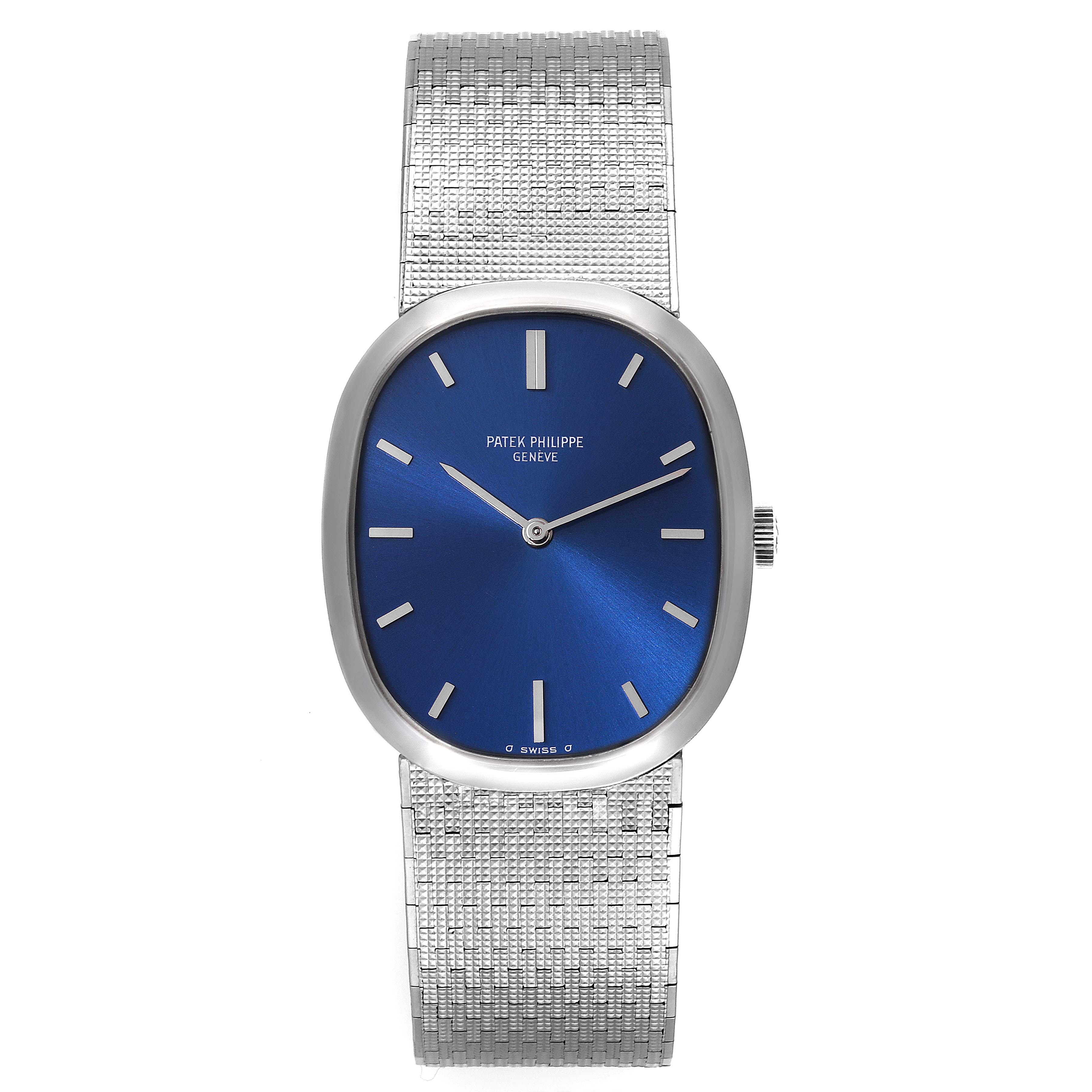 The image shows a front view of the Patek Philippe Golden Ellipse 3548 Women's White Gold Blue Dial 3548 Women's White Gold Blue Dial watch with a blue dial and a silver bracelet.