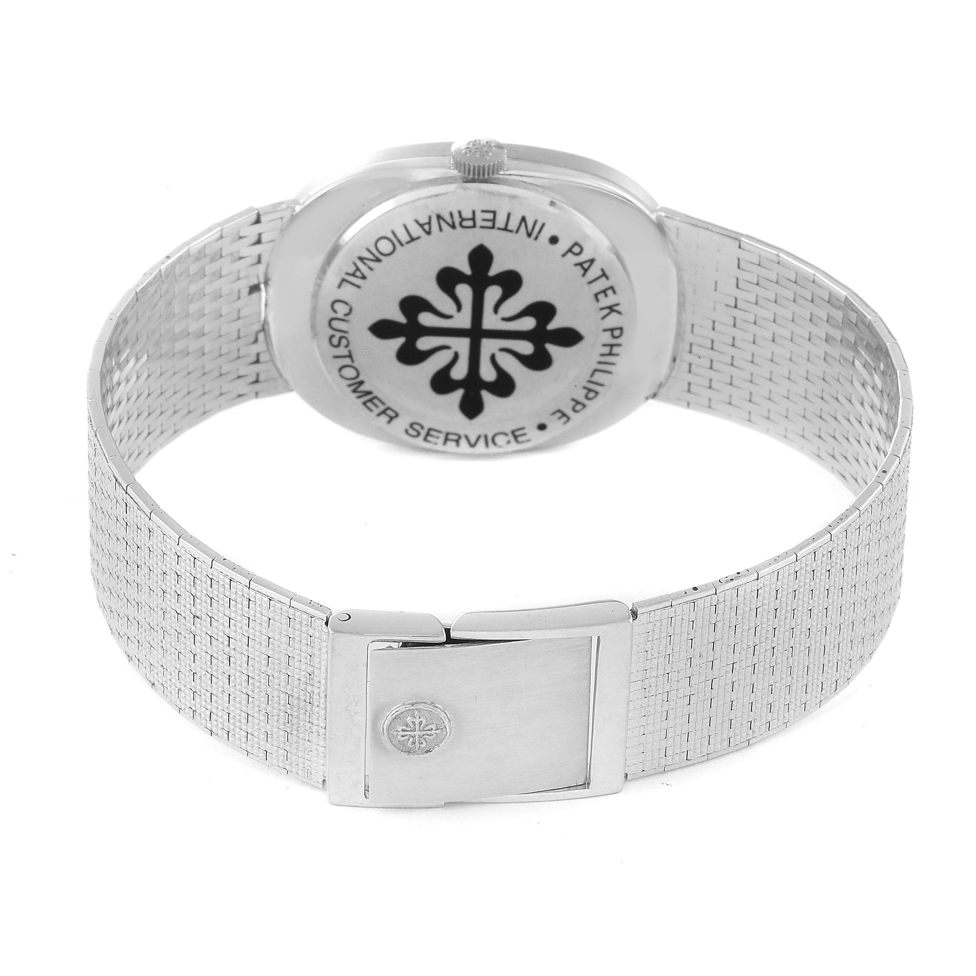 The image shows the back case, crown, and closed clasp of the Patek Philippe Golden Ellipse 3548 Women's White Gold Blue Dial 3548 Women's White Gold Blue Dial watch.