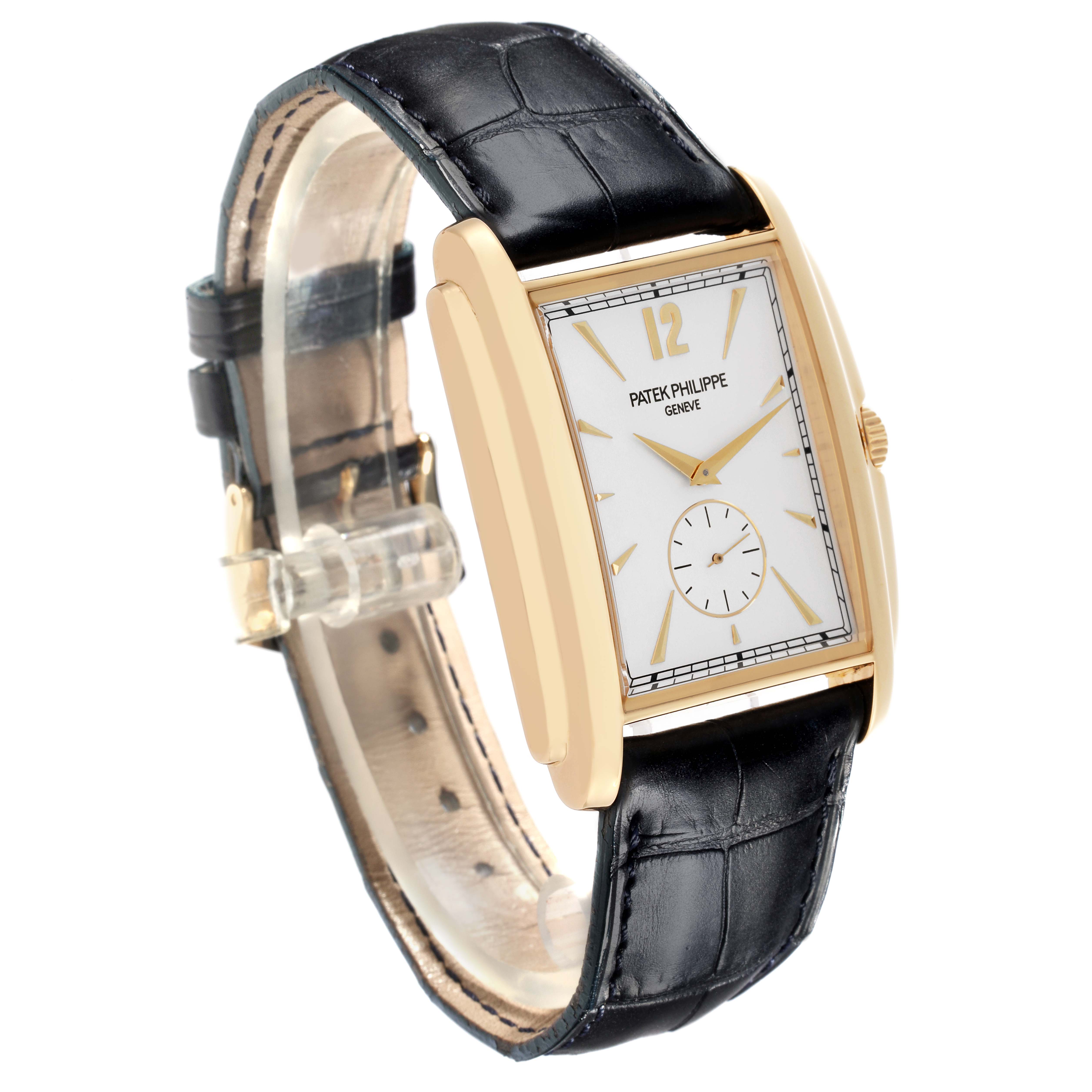 The Patek Philippe Gondolo 5124J Men's Yellow Gold Silver Dial 5124J Men's Yellow Gold Silver Dial watch is shown at a three-quarter angle, highlighting its rectangular case, dial, and black leather strap.