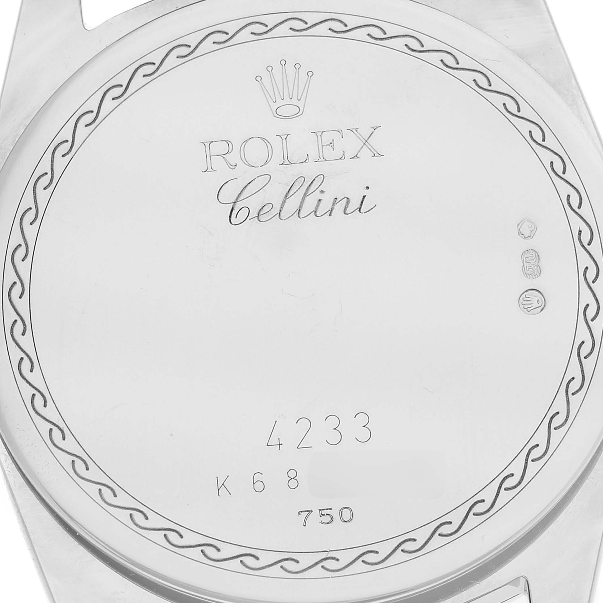 This image shows the back case of a Rolex Cellini 4233 Men's Steel and Gold (two tone) Black Dial 4233 Men's Steel and Gold (two tone) Black Dial watch with engraved details and hallmarks.