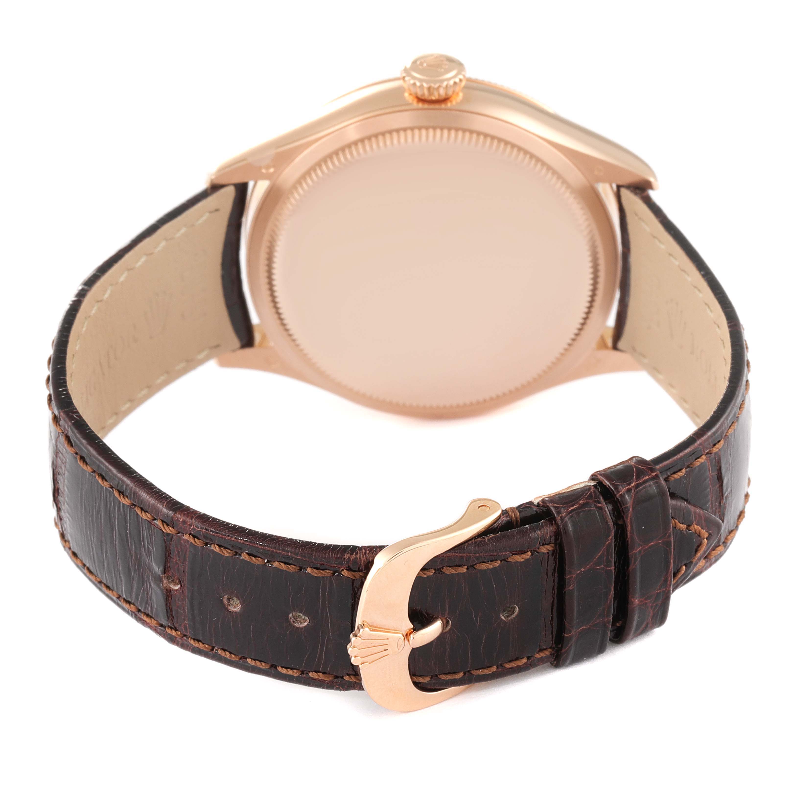 This image shows the back view of a Rolex Cellini 50505 Men's Rose Gold Pink Dial 50505 Men's Rose Gold Pink Dial watch, including the case back, crown, and brown leather strap with a gold buckle.