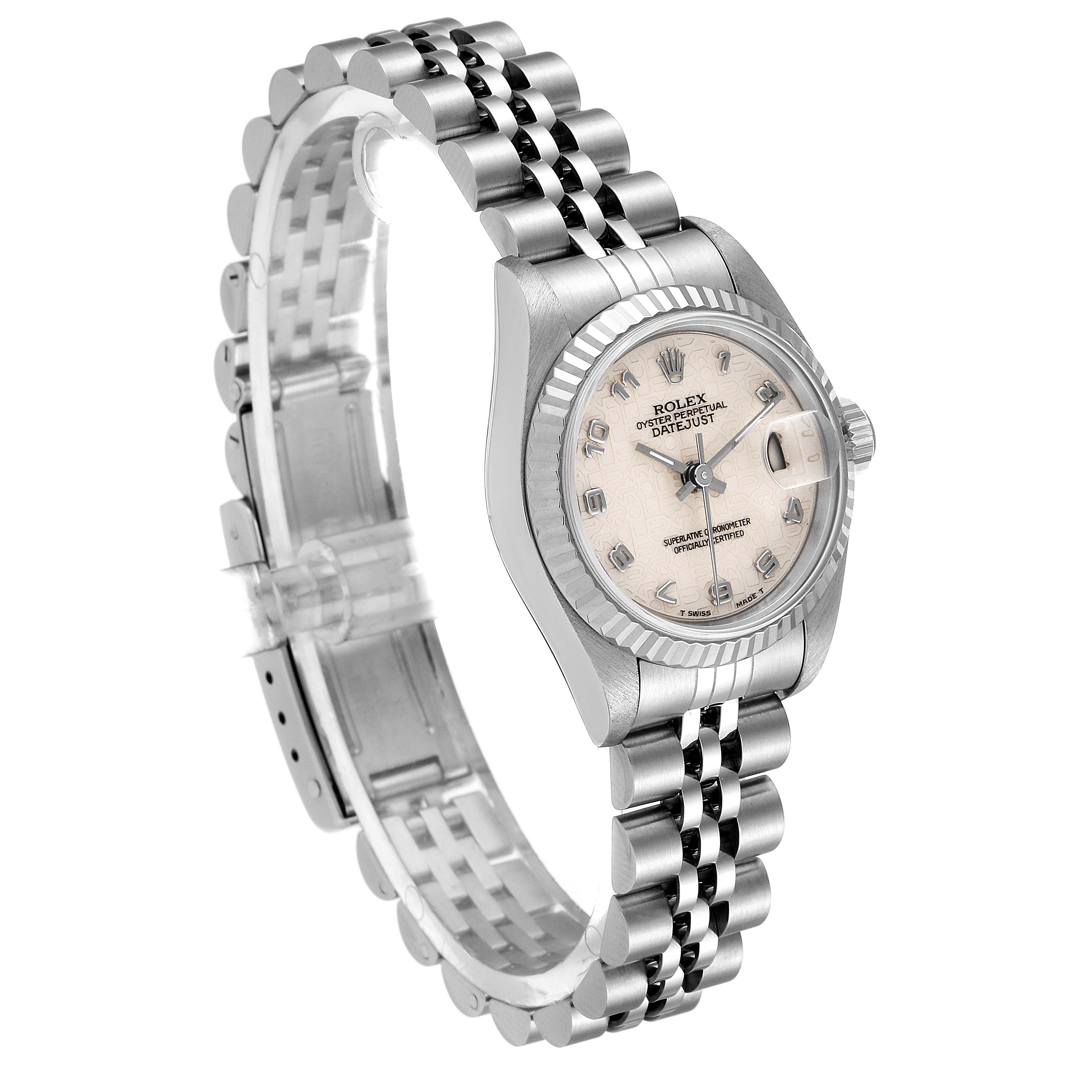 The Rolex Datejust 69174 Women
s Stainless Steel Silver Dial 69174 Women
s Stainless Steel Silver Dial watch is shown at an angled view, displaying the face, bezel, and Jubilee bracelet.