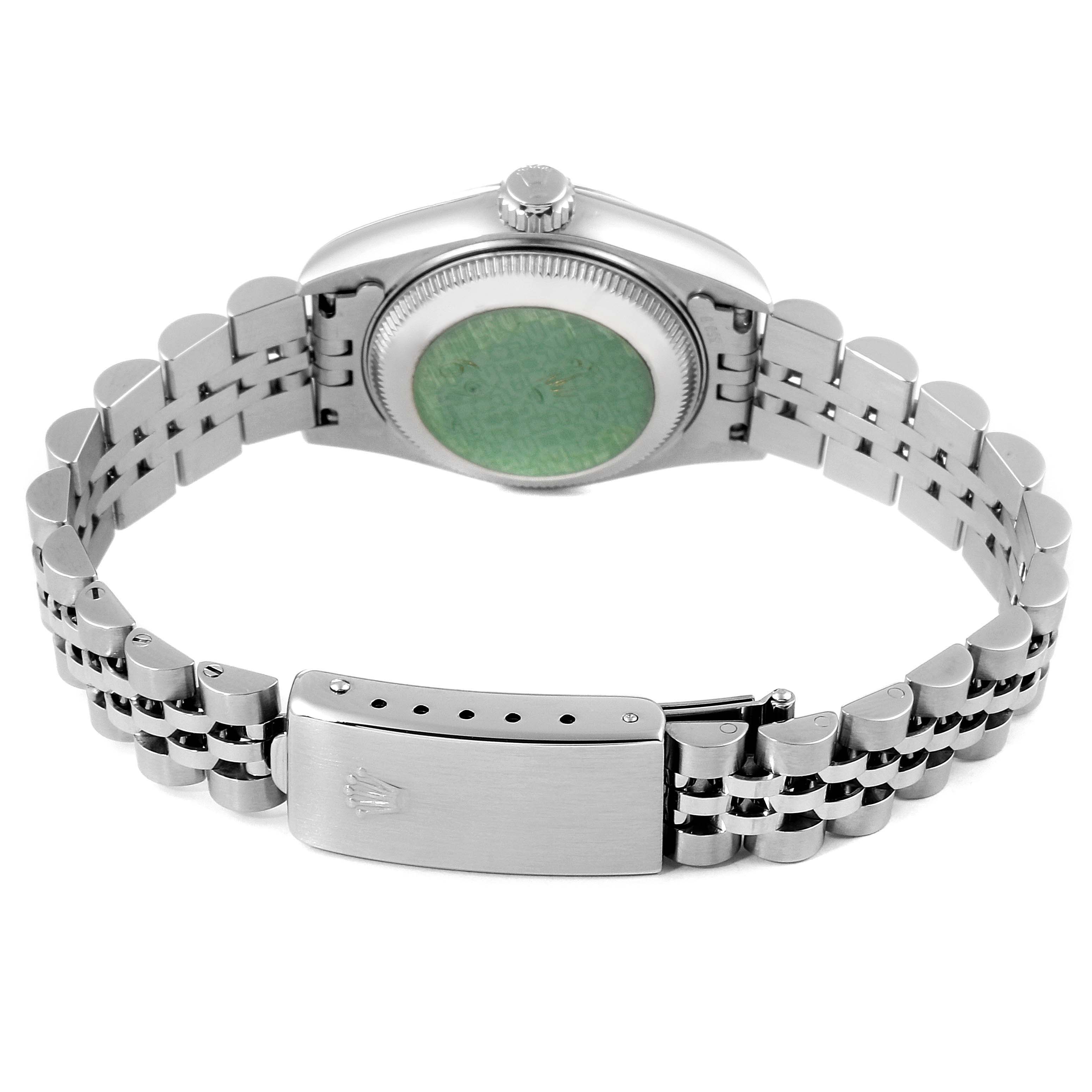 This image shows the back of a Rolex Datejust 69174 Women
s Stainless Steel Silver Dial 69174 Women
s Stainless Steel Silver Dial watch, highlighting the case back, crown, and bracelet clasp.