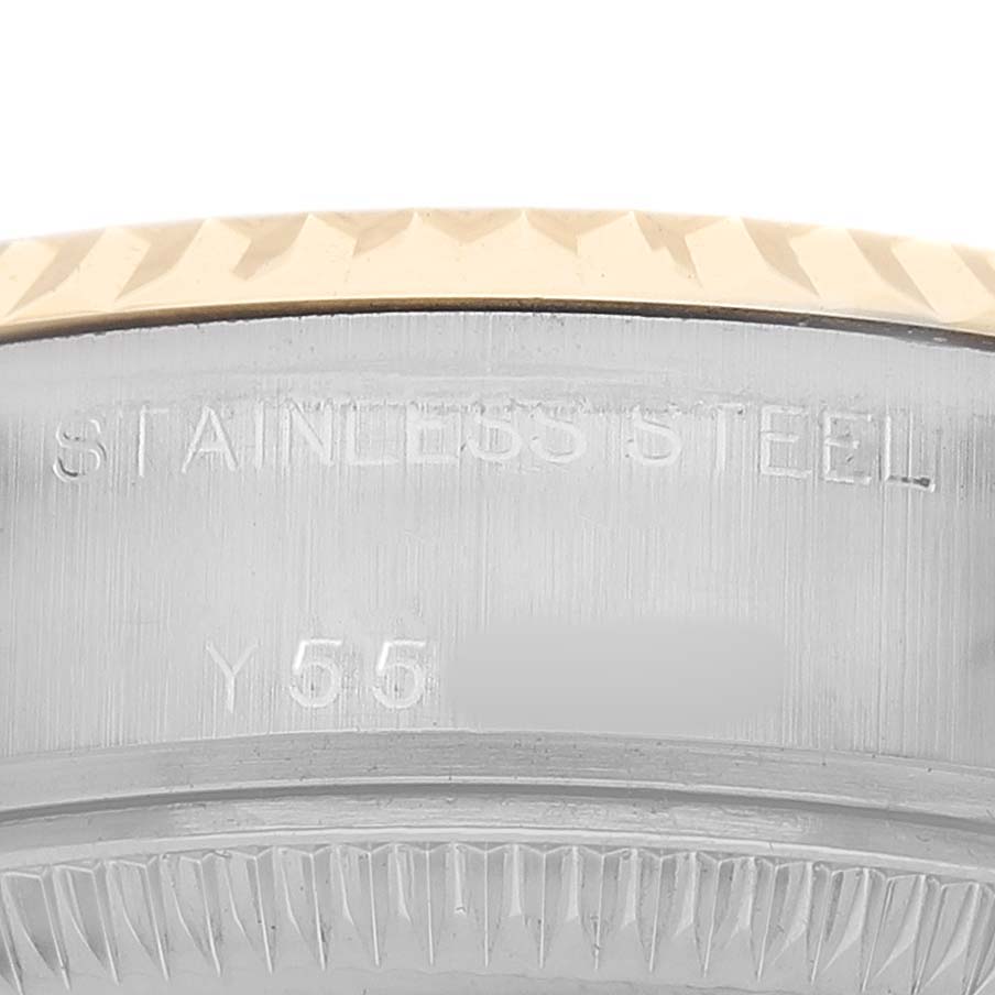 The image shows a close-up of the side casing of a Rolex Datejust 79173 Women's Stainless Steel Champagne Dial, highlighting the stainless steel part and engraving.