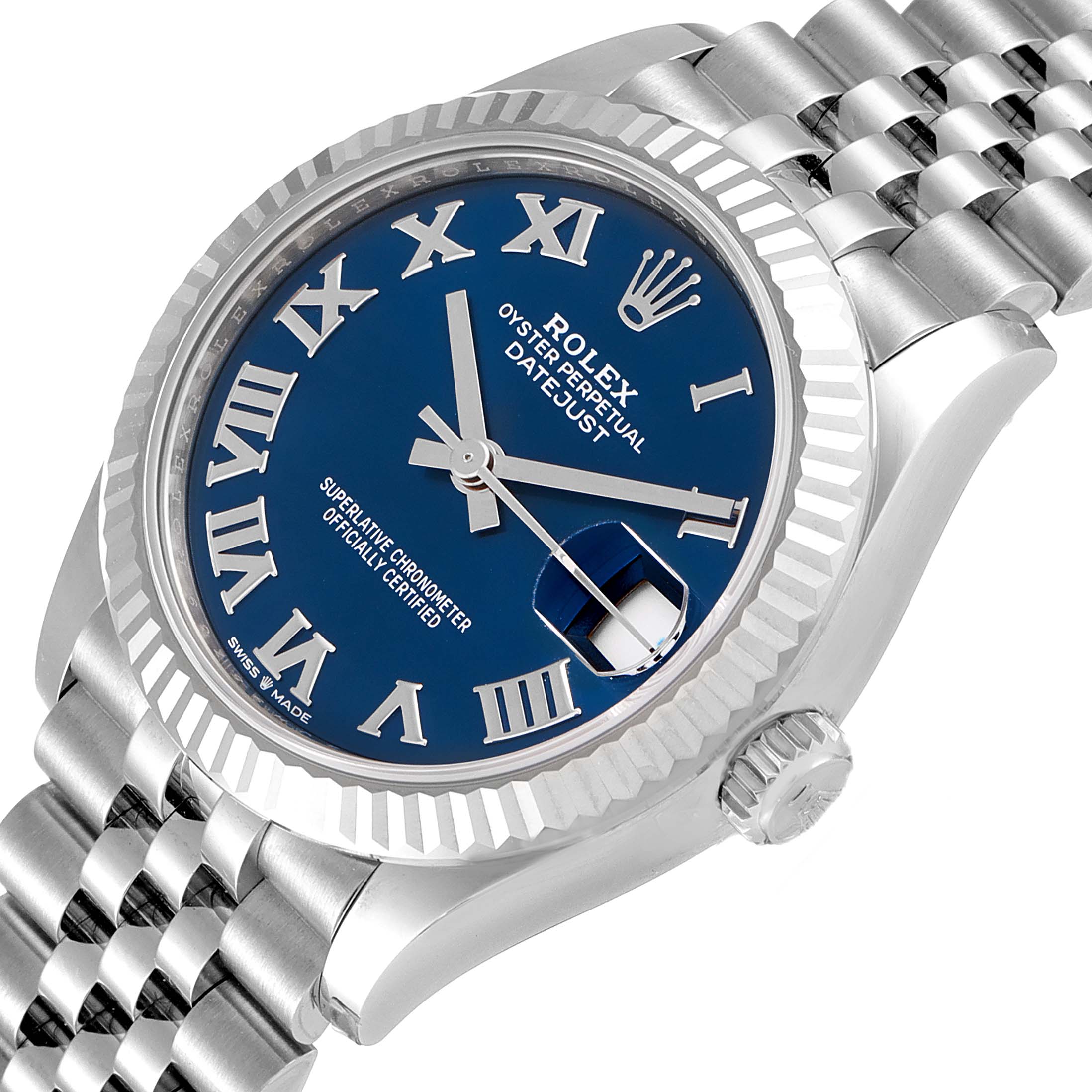 This image shows a close-up view of a Rolex Mid-Size 278274 Women's Stainless Steel Blue Dial 278274 Women's Stainless Steel Blue Dial Oyster Perpetual Datejust watch, highlighting the dial, bezel, and part of the bracelet.