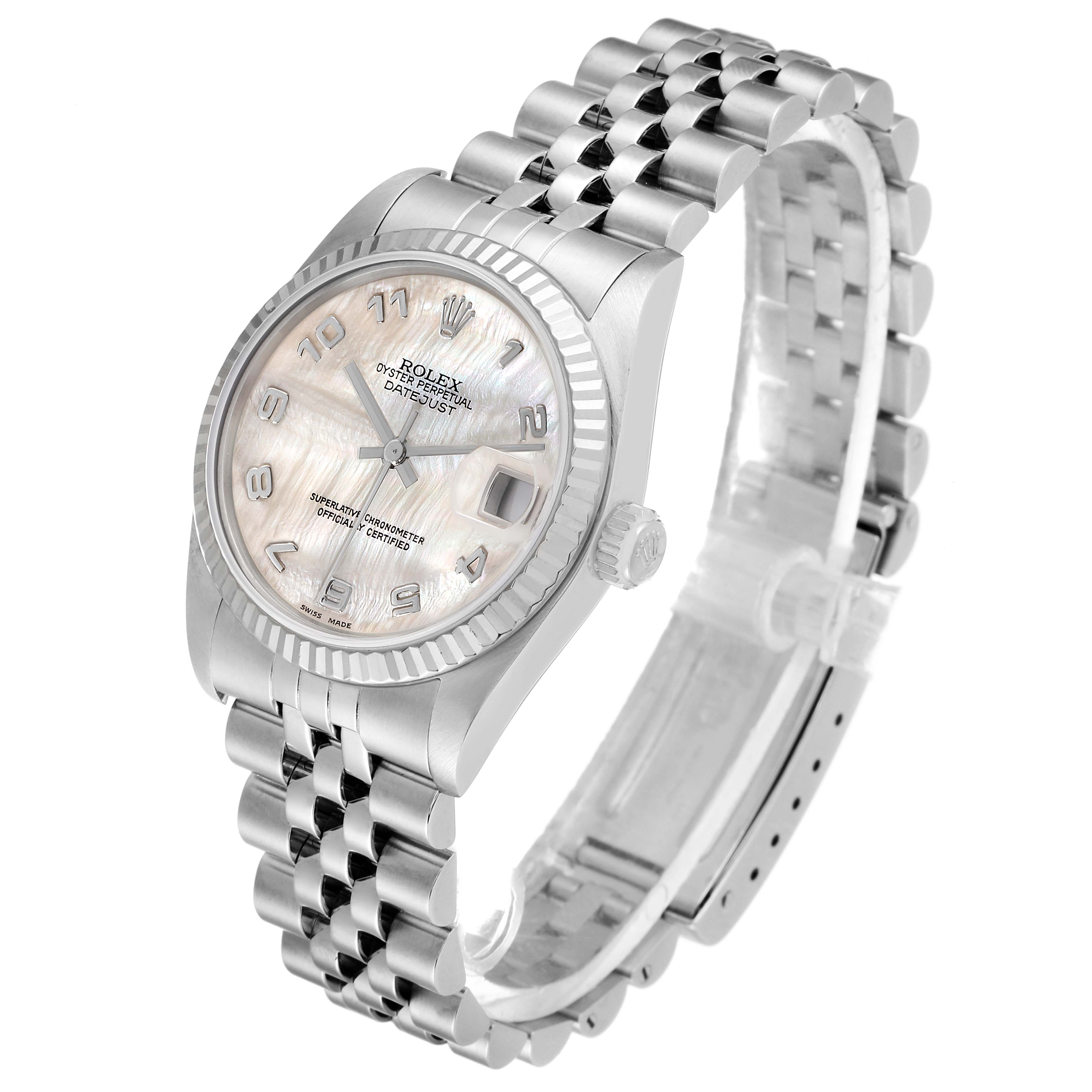 The image shows a Rolex Mid-Size 78274 Women
s Stainless Steel White Dial 78274 Women
s Stainless Steel White Dial Datejust watch at an angle highlighting the face, bezel, and bracelet.