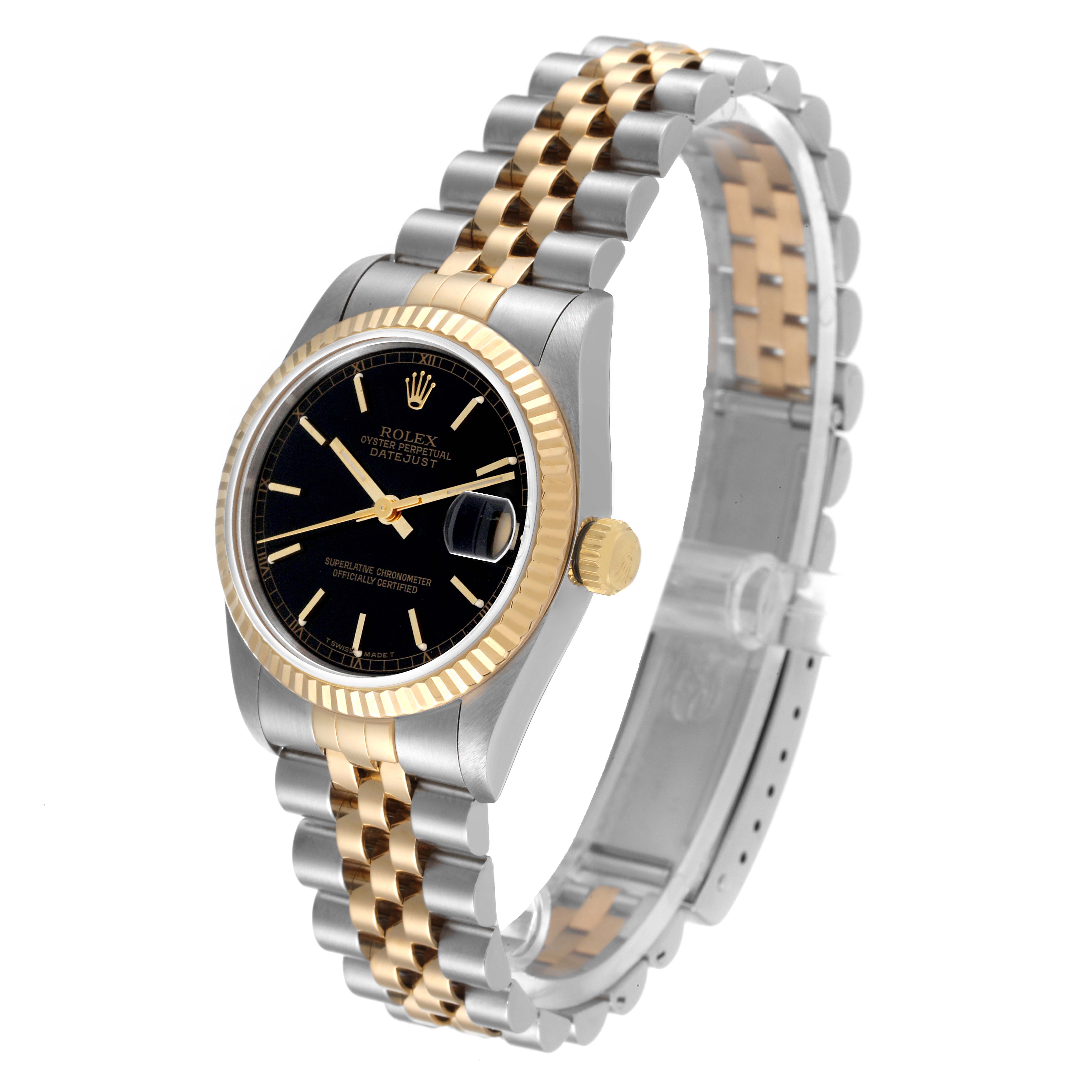 The image shows a Rolex Datejust Mid-Size watch at an angled view, highlighting its two-tone bracelet, black dial, and fluted bezel.