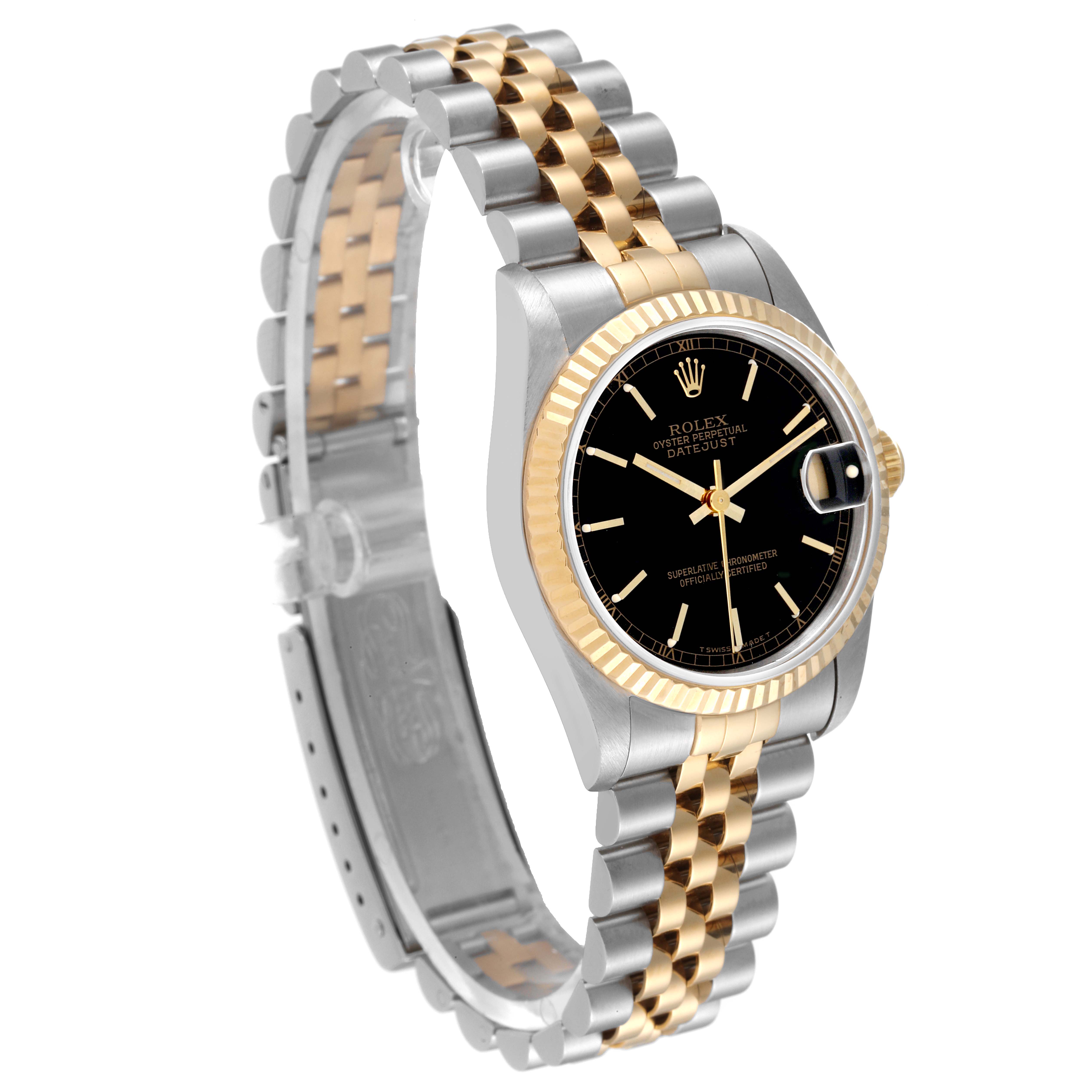 The Rolex Mid-Size 68273 Women
s Steel and Gold (two tone) Black Dial 68273 Women
s Steel and Gold (two tone) Black Dial watch is shown at a slight angle, featuring a two-tone bracelet, a black dial, and a fluted bezel.