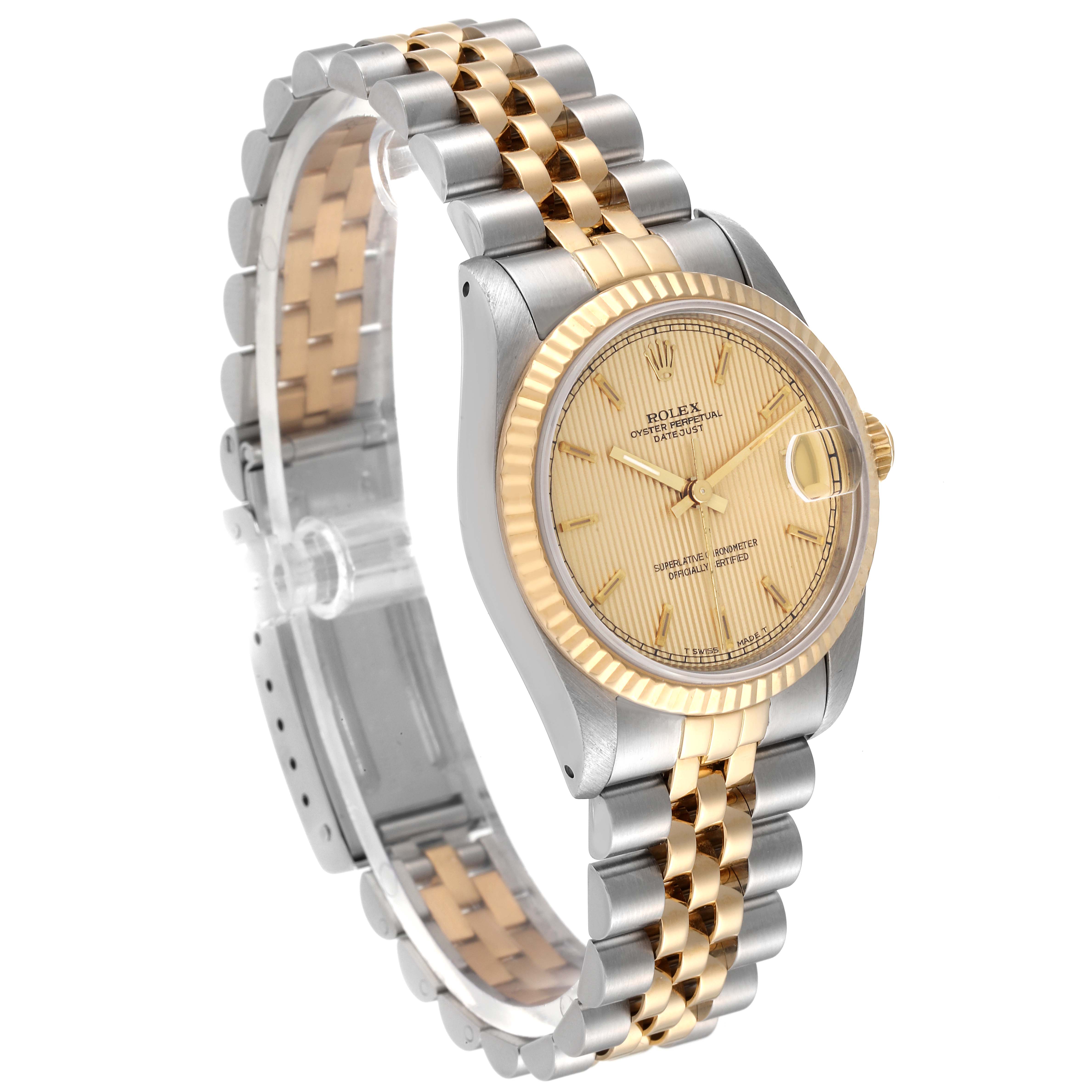 The image shows a side angle of the Rolex Mid-Size 68273 Women
s Steel and Gold (two tone) Champagne Dial 68273 Women
s Steel and Gold (two tone) Champagne Dial watch, highlighting the two-tone bracelet, fluted bezel, and champagne dial.
