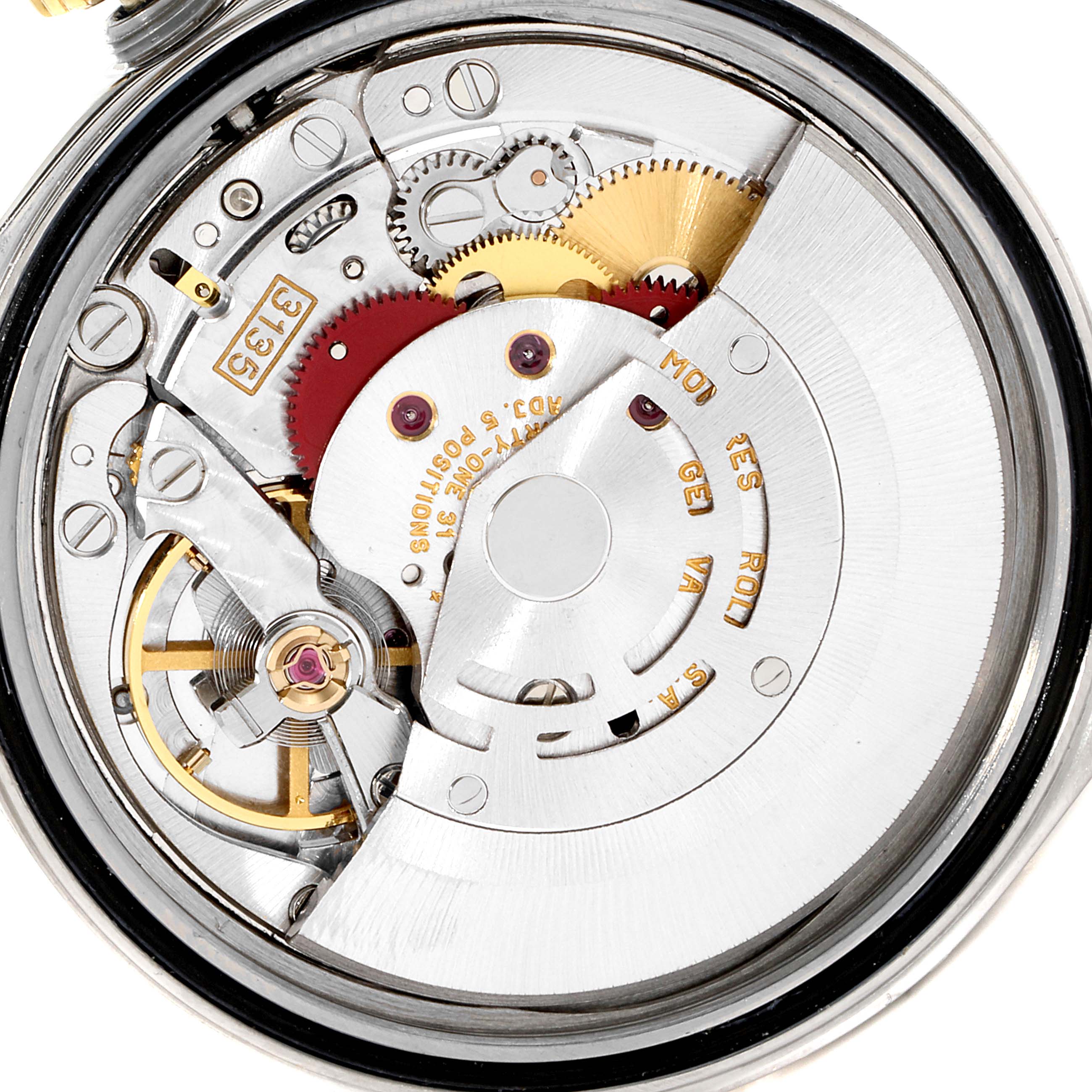 This is an internal view of the movement mechanism of a Rolex Datejust 16233 Men's Steel and Gold (two tone) Champagne Dial 16233 Men's Steel and Gold (two tone) Champagne Dial watch, showing gears and components.