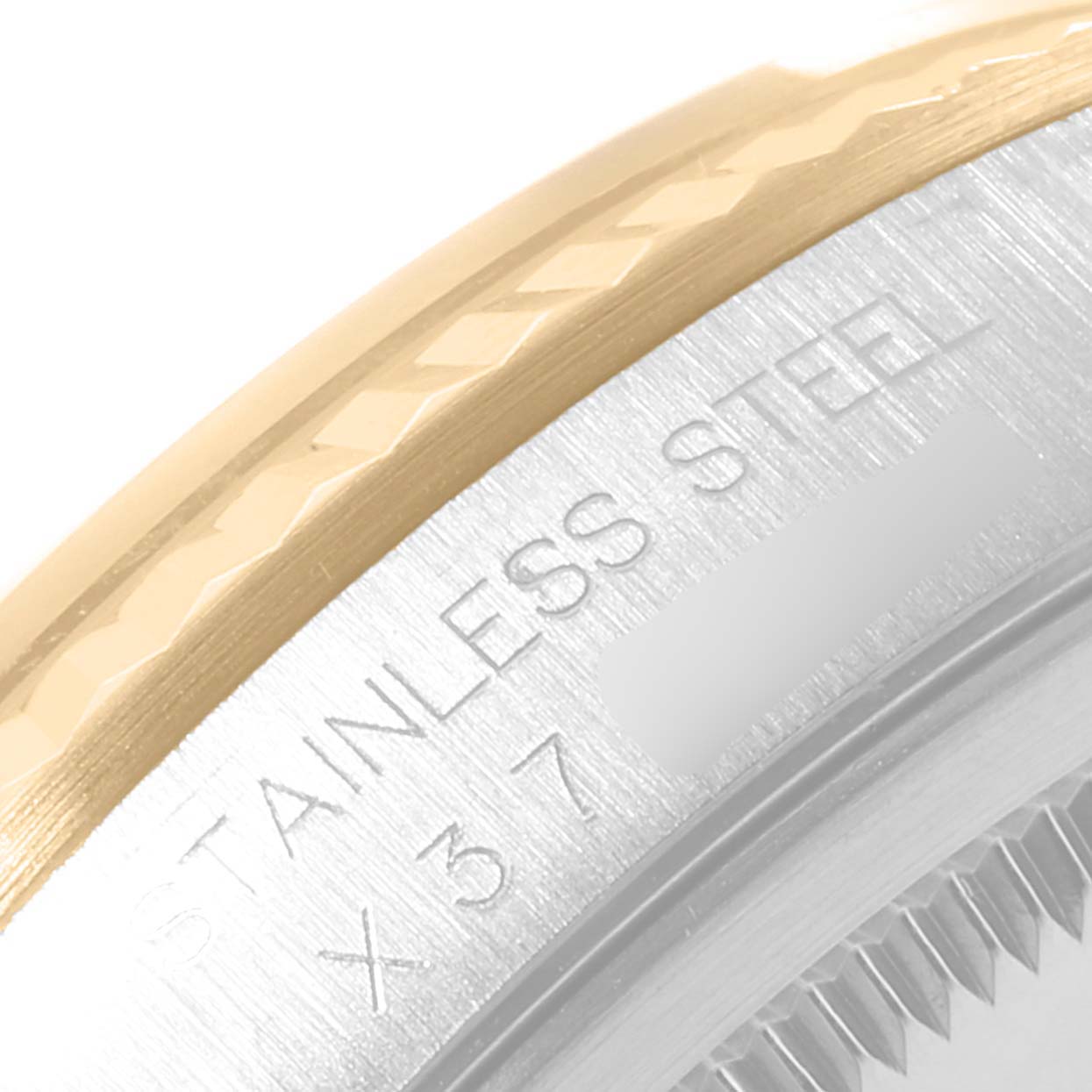 This image shows a close-up of the bezel and case side of a Rolex Datejust 16233 Men
s Steel and Gold (two tone) Grey Dial 16233 Men
s Steel and Gold (two tone) Grey Dial watch, highlighting the materials and engravings.