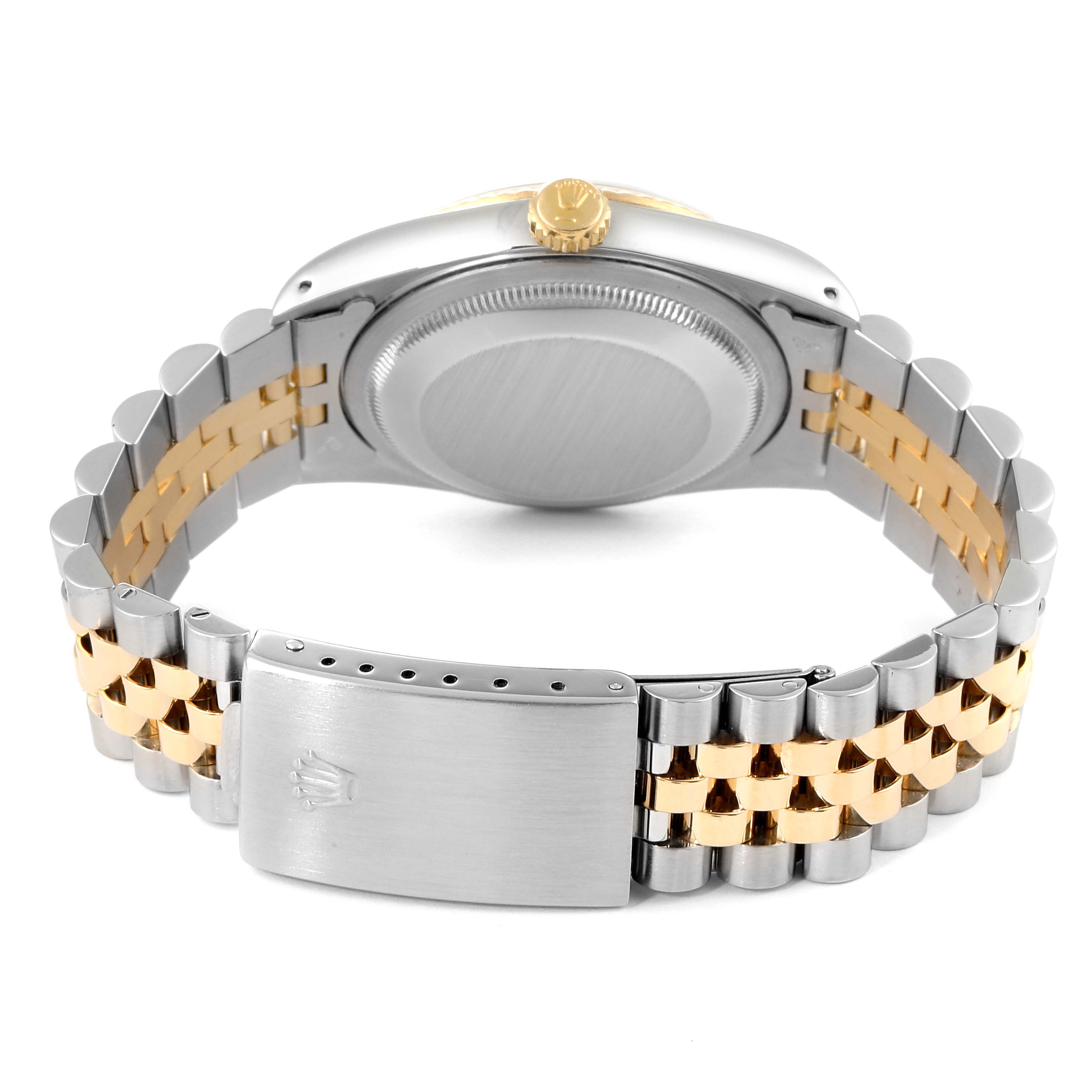 The image shows the back view of a Rolex Datejust 16233 Men's Steel and Gold (two tone) Champagne Dial 16233 Men's Steel and Gold (two tone) Champagne Dial watch, highlighting the case back and the two-tone bracelet with the clasp.