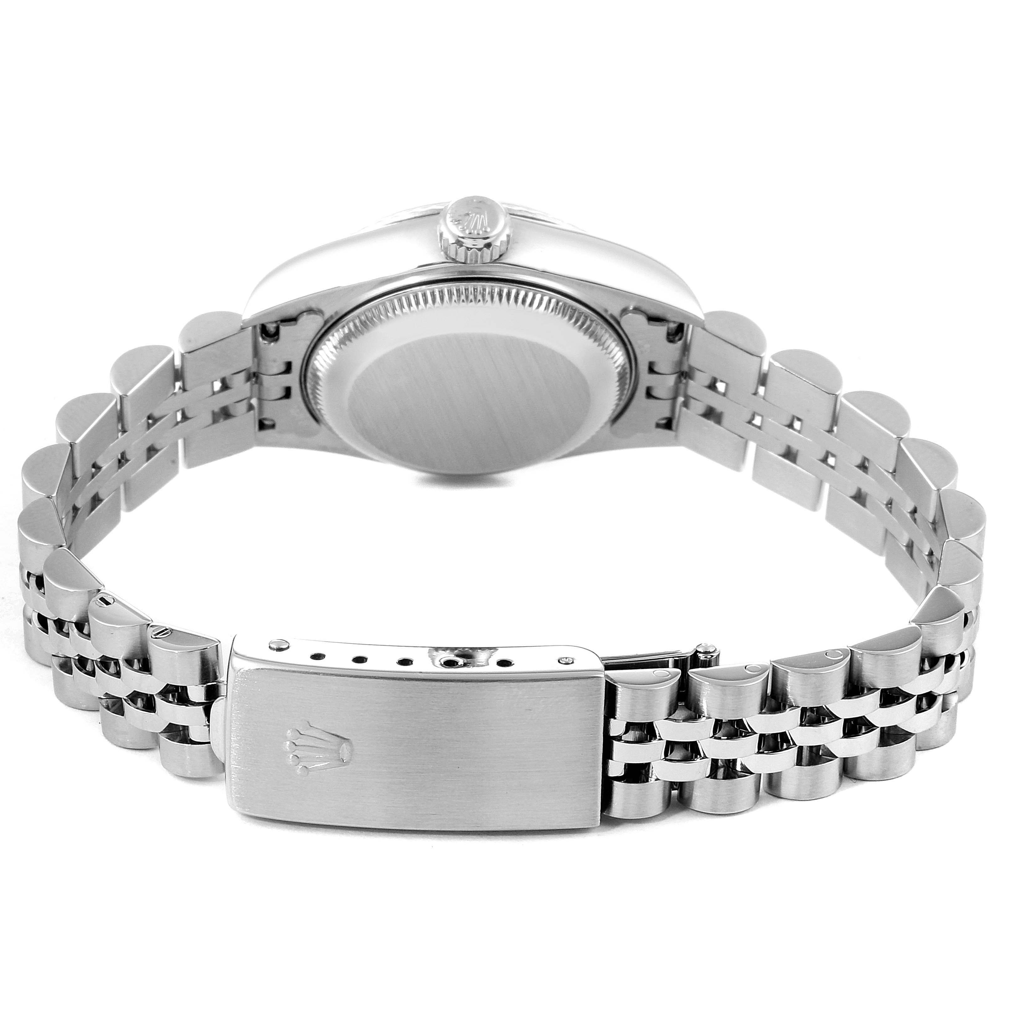 This image shows the back view of a Rolex Datejust 69174 Women's Stainless Steel Pink Dial 69174 Women's Stainless Steel Pink Dial watch, focusing on its case back, crown, and bracelet clasp.