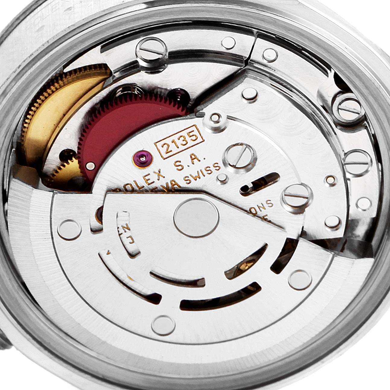 This image shows an internal close-up of the Rolex Datejust 69174 Women's Stainless Steel Pink Dial 69174 Women's Stainless Steel Pink Dial watch movement, specifically the automatic rotor and other components.