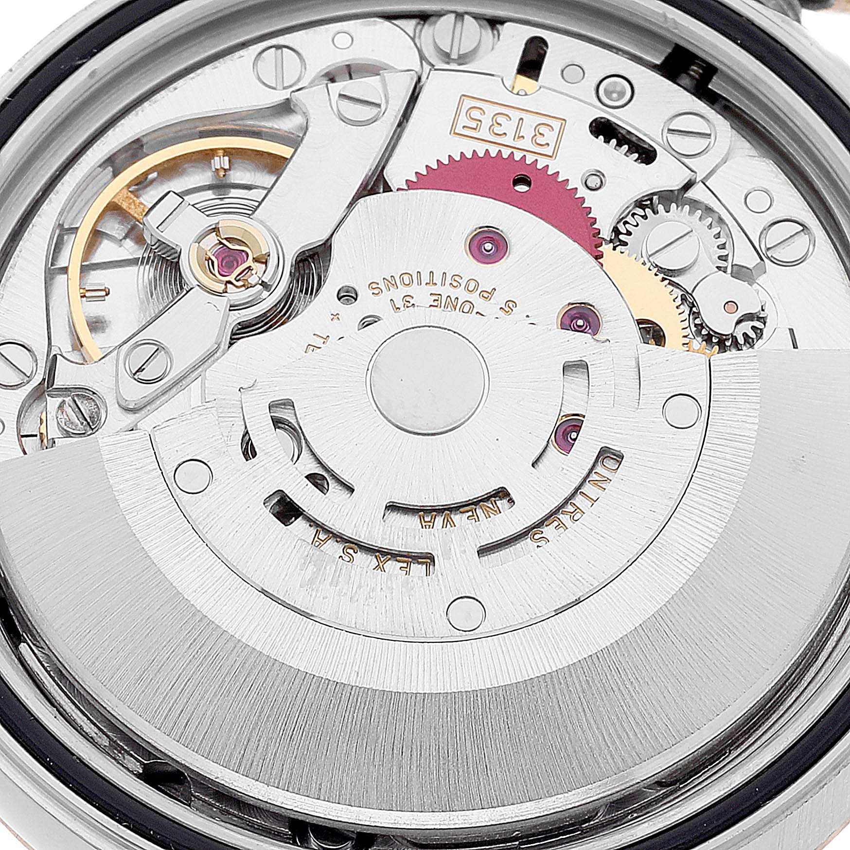This image shows a close-up view of the inner mechanical movement of a Rolex Datejust 16233 Men's Steel and Gold (two tone) Black Dial 16233 Men's Steel and Gold (two tone) Black Dial watch.