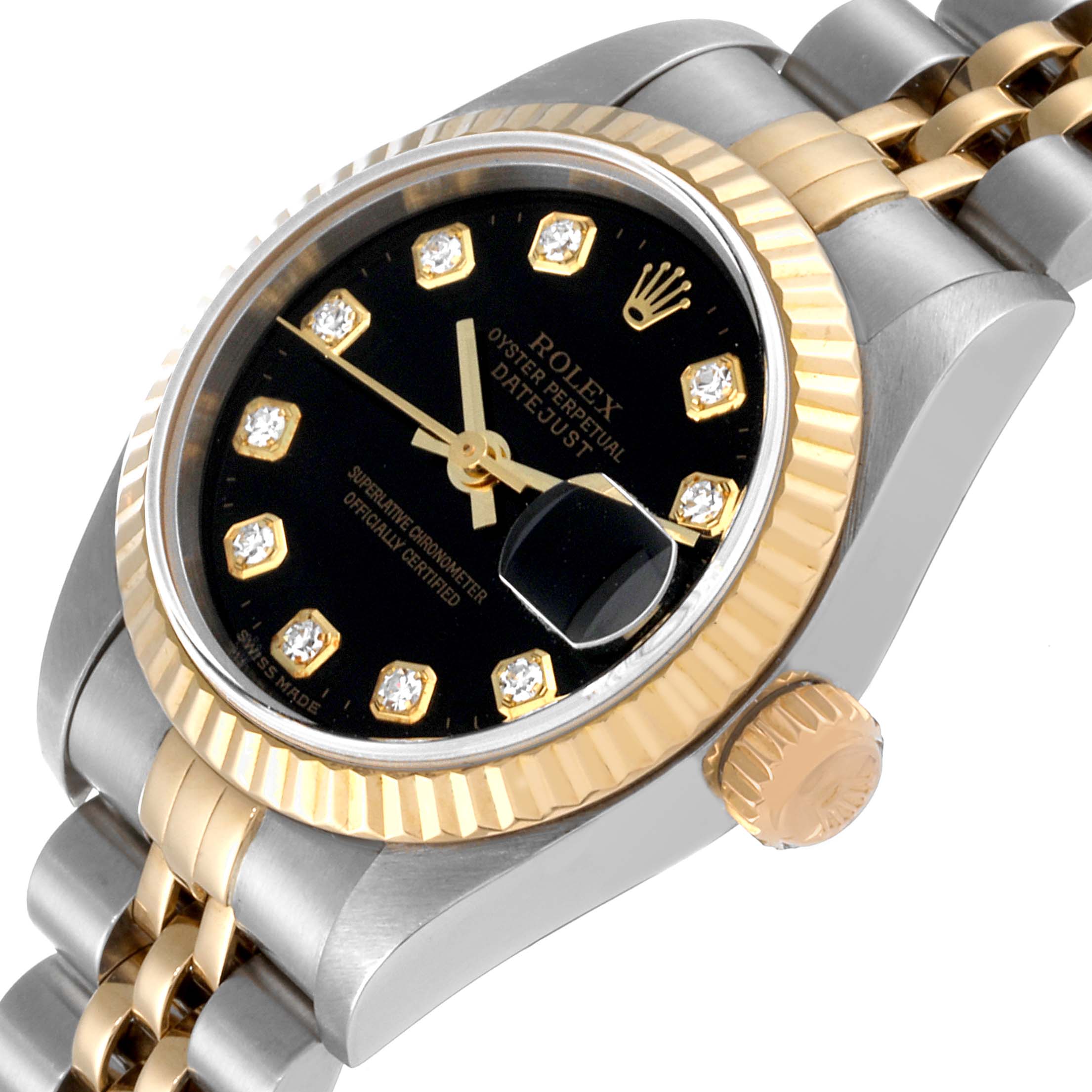 The image shows a Rolex Datejust 79173 Women's Steel and Gold (two tone) Black Dial 79173 Women's Steel and Gold (two tone) Black Dial watch from a slight overhead angle, highlighting the bezel, dial, and part of the bracelet.