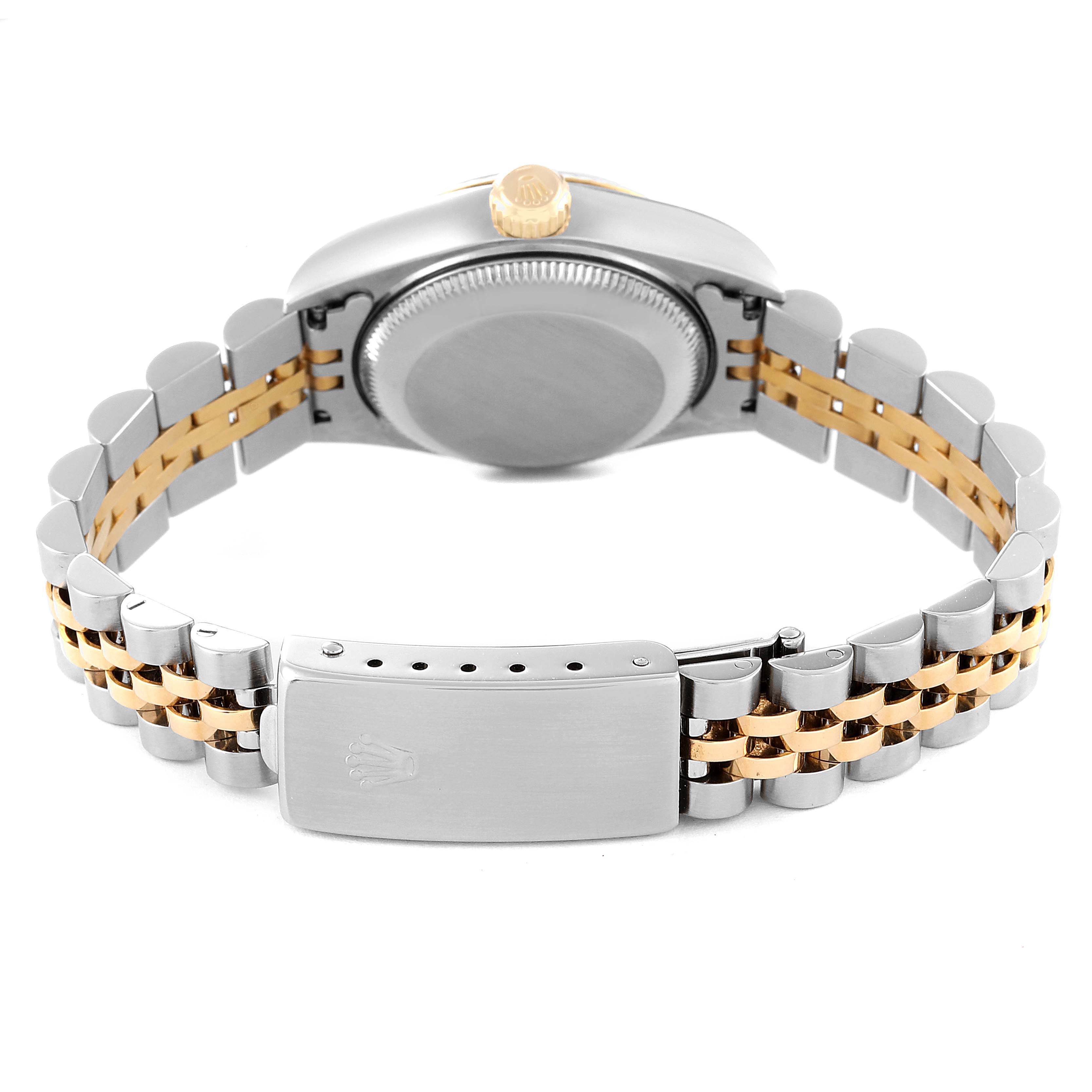 The image shows the back view of a Rolex Datejust 79173 Women's Steel and Gold (two tone) Black Dial 79173 Women's Steel and Gold (two tone) Black Dial watch, highlighting its case back, crown, and Jubilee bracelet.