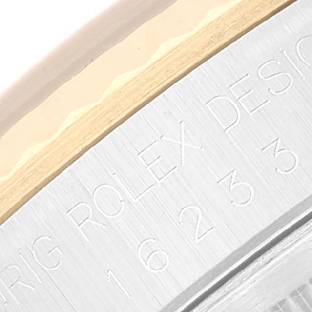 The close-up image shows the engraved inner bezel of a Rolex Datejust 16233 Men's Steel and Gold (two tone) Blue Dial 16233 Men's Steel and Gold (two tone) Blue Dial watch model.