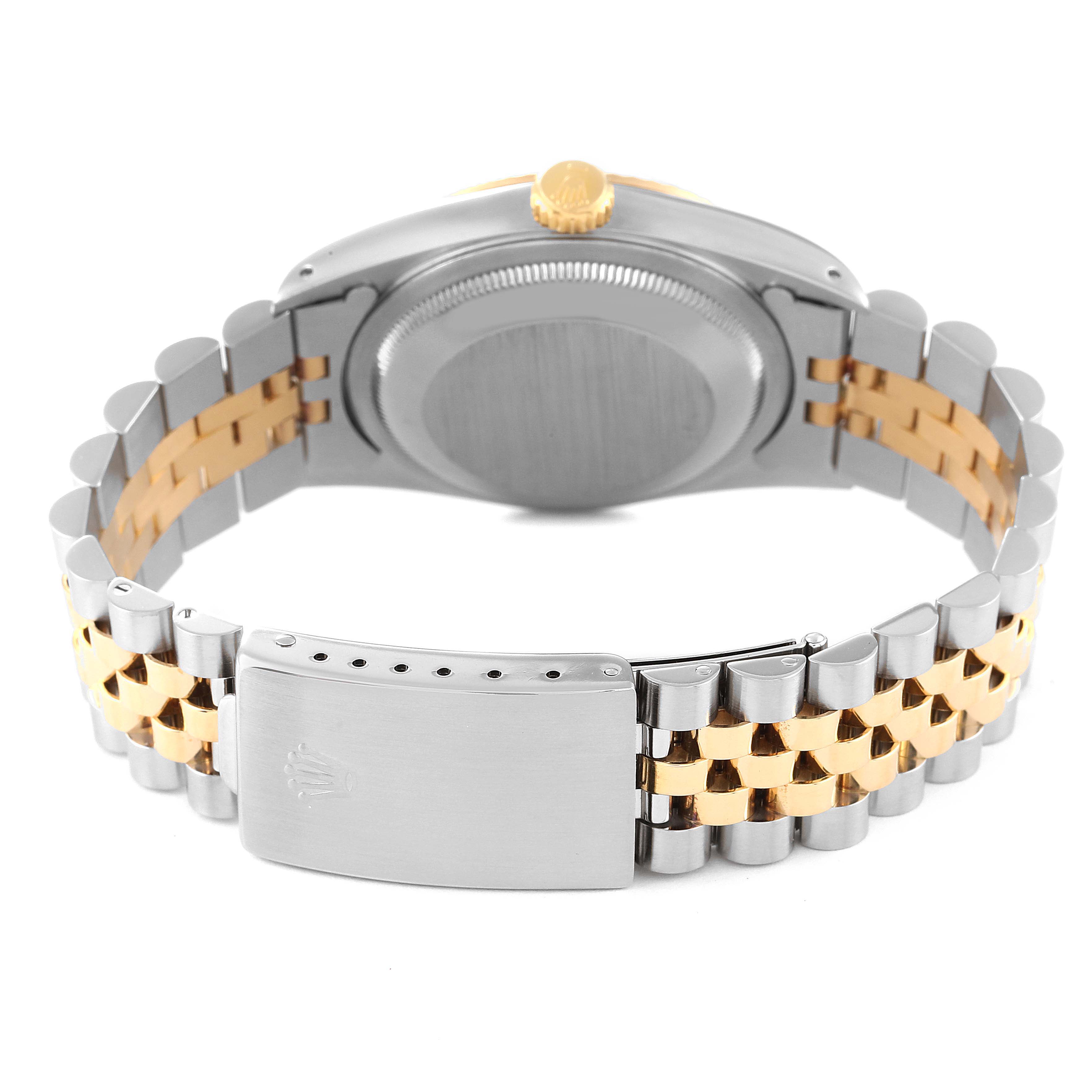 The image shows the back and clasp of a Rolex Datejust 16233 Men's Steel and Gold (two tone) Blue Dial 16233 Men's Steel and Gold (two tone) Blue Dial watch with a two-tone bracelet.