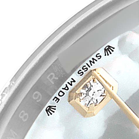 Close-up of a Rolex Datejust 279163 Women's Steel and Gold (two tone) Mother of Pearl Dial 279163 Women's Steel and Gold (two tone) Mother of Pearl Dial watch face, showing a diamond hour marker and "SWISS MADE" text.