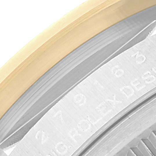 The image shows a close-up of the bezel and part of the caseback of a Rolex Datejust 279163 Women's Steel and Gold (two tone) Mother of Pearl Dial 279163 Women's Steel and Gold (two tone) Mother of Pearl Dial watch.