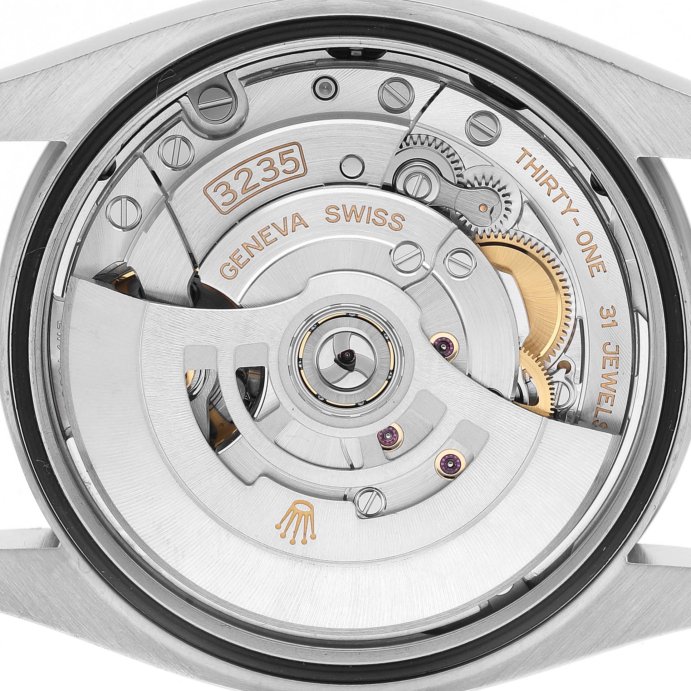 The image shows a close-up of the Rolex Datejust 126234 Men's Stainless Steel Grey Dial's case back, revealing its movement and rotor.