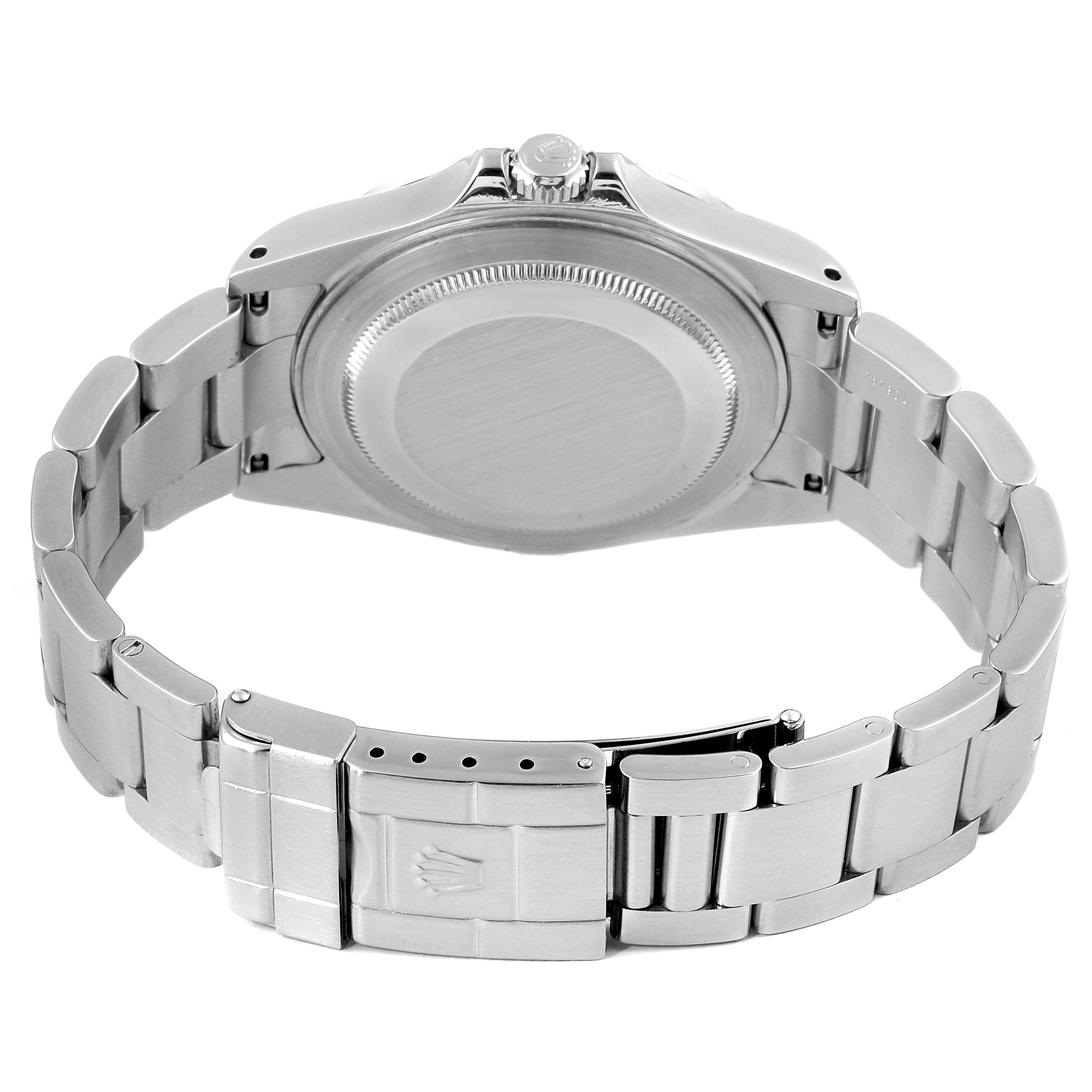This image shows the back casing and clasp of a Rolex Explorer 16570 Men
s Stainless Steel White Dial 16570 Men
s Stainless Steel White Dial watch from a rear angle.