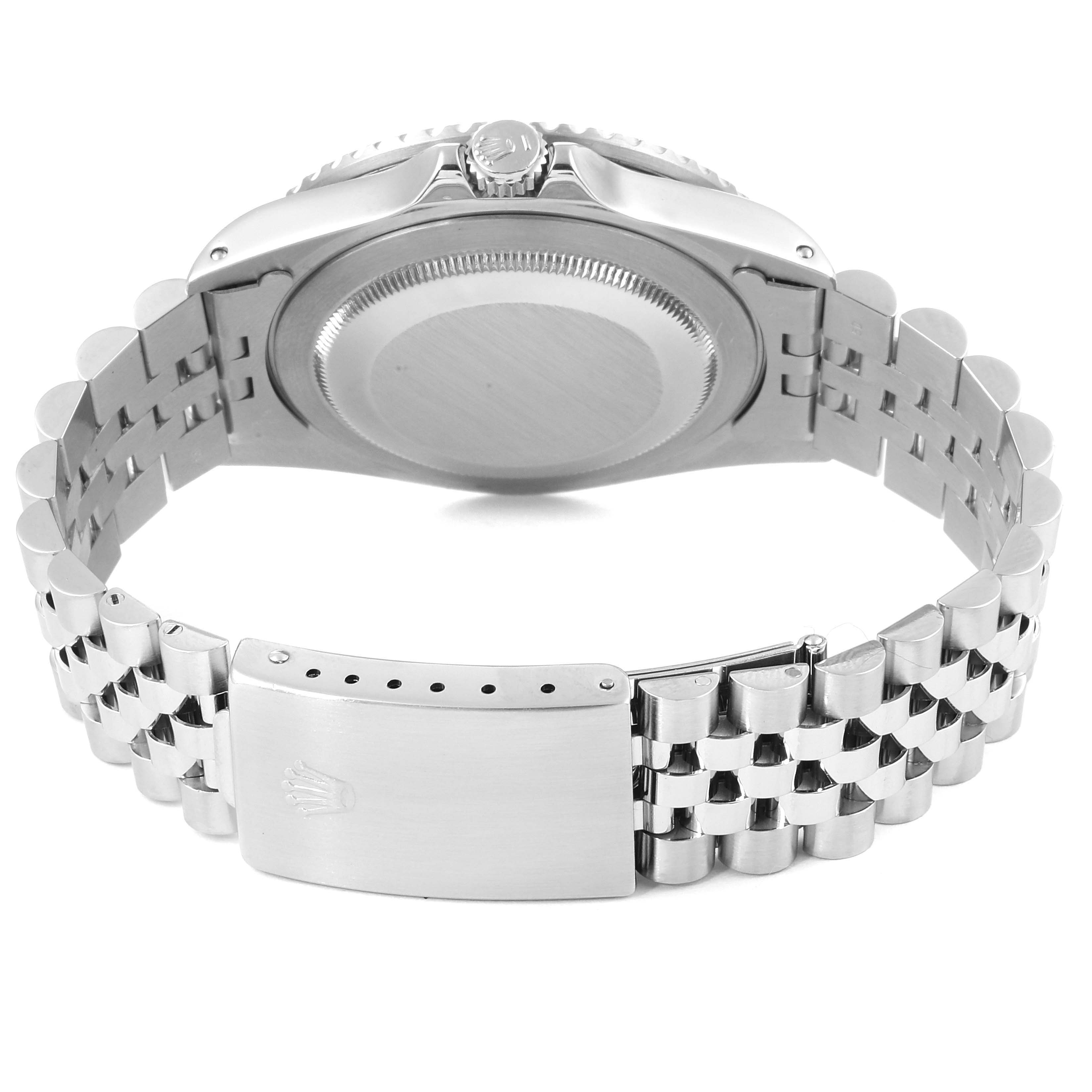 This image shows the back case and bracelet of a Rolex GMT-Master 16700 Men
s Stainless Steel Black Dial 16700 Men
s Stainless Steel Black Dial watch from a rear angle.