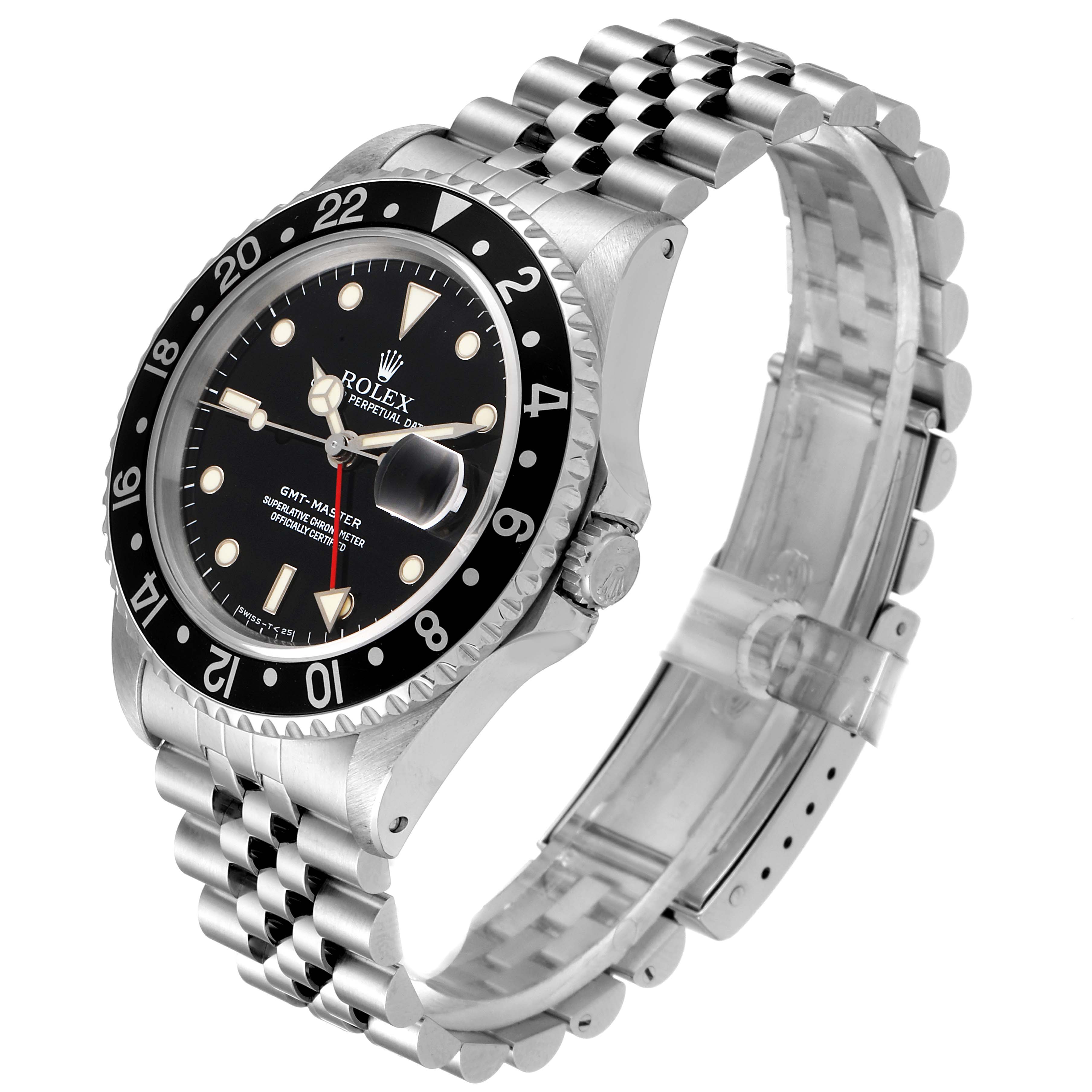 The image shows a Rolex GMT-Master 16700 Men
s Stainless Steel Black Dial 16700 Men
s Stainless Steel Black Dial watch at an angle that highlights its face, bezel, crown, and part of the bracelet.