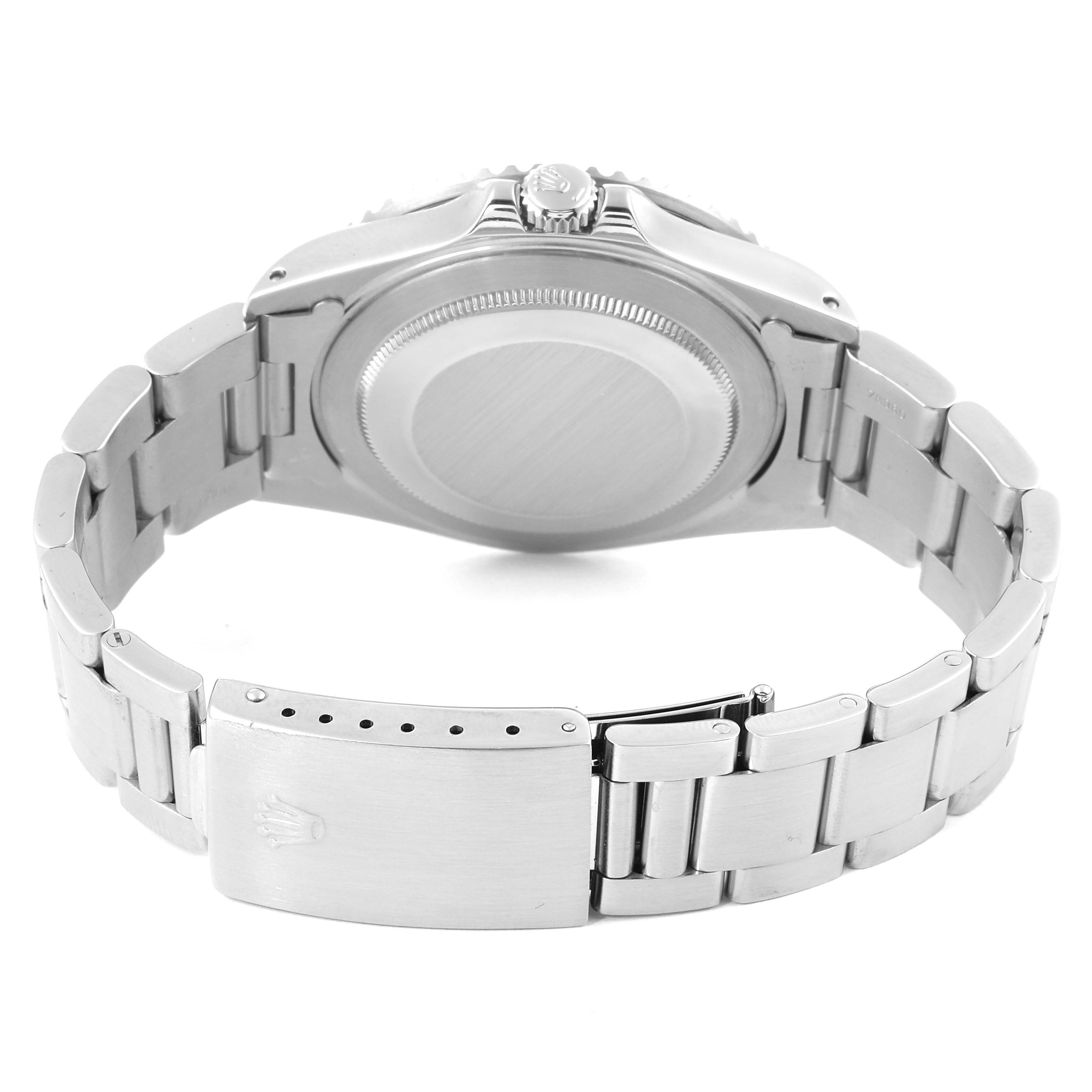 This image shows the back case and bracelet clasp of a Rolex GMT-Master 16710 Men's Stainless Steel Black Dial 16710 Men's Stainless Steel Black Dial watch from a bottom rear angle.